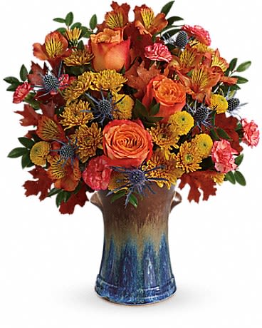  Classic Autumn Bouquet - Classic fall colors and a stunning stoneware vase make this arrangement an autumnal favorite! Its glorious orange roses and delicate alstroemeria look oh-so-lovely against the bold cornflower blue and rich bronze hues of this hand-glazed vessel. A gift that keeps on giving, it later becomes an elegant kitchen utensil holder. 