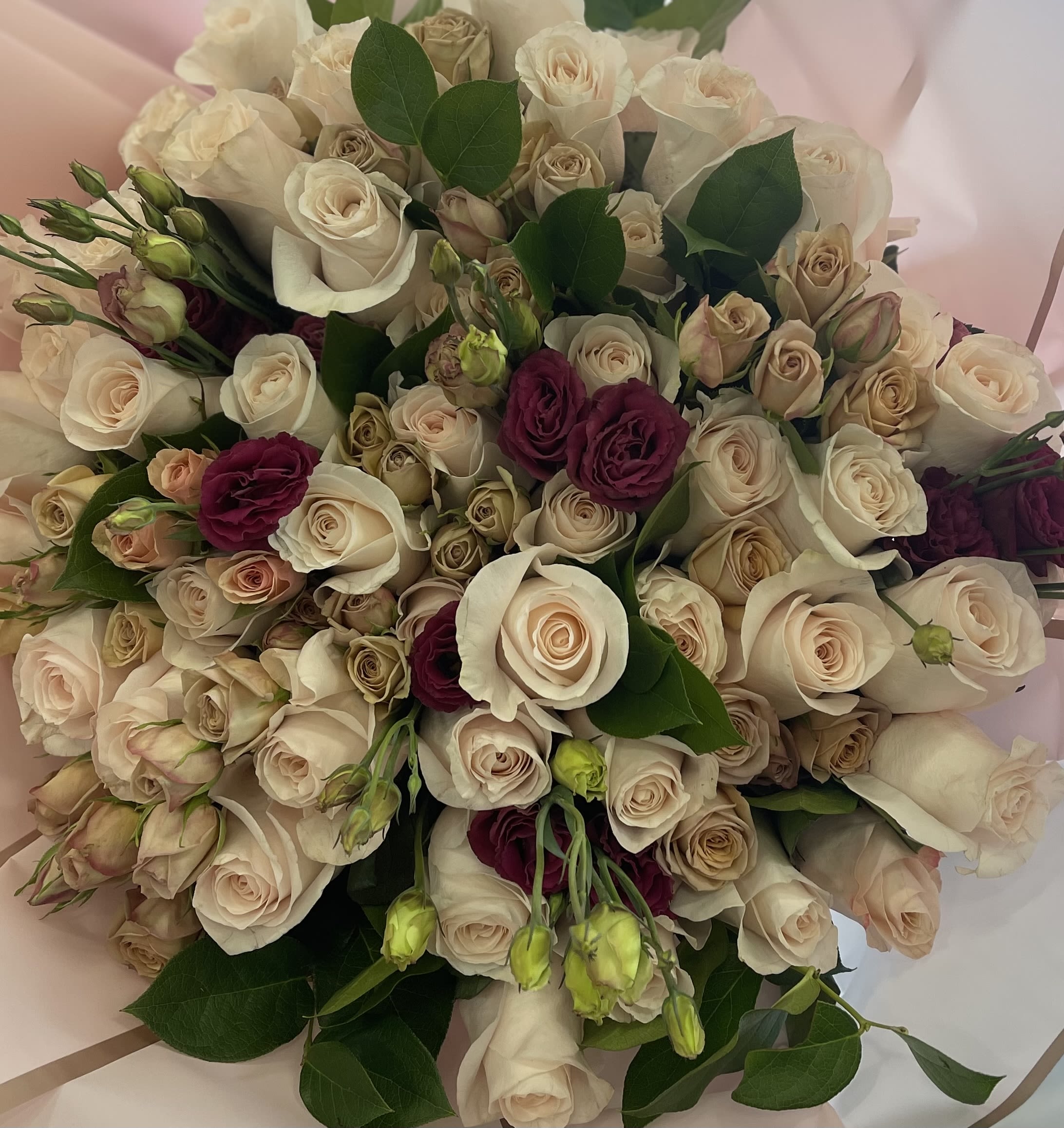 Cocoa Rose Boquet  - A beautifully wrapped bouquet featuring soft blush blooms paired with rich, earthy tones. Layers of natural textures and warm hues create a modern yet organic aesthetic, finished with an elegant wrap that adds a touch of understated luxury. Perfect for gifting, gatherings, or adding effortless beauty to any space.    Some florals are seasonal, if particular flower will not be available due to season, we will substitute for similar flower, composition, color pallet and value of the arrangements as closely as possible. All effort to create a floral arrangement as close to the photo shown, the actual arrangement may vary slightly in its appearance from the photo shown. If you have any questions about your order, we welcome you to call us in or email  