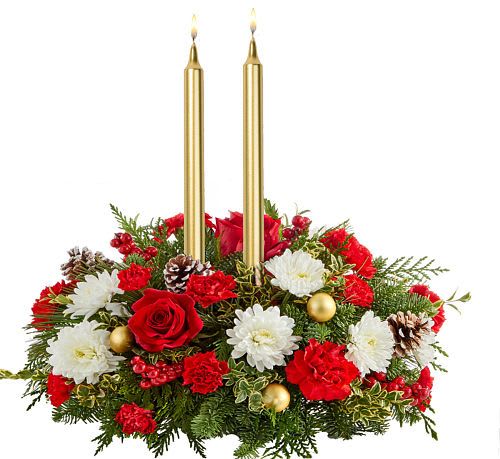 Candlelight Enchantment Centerpiece - The &quot;Candlelight Enchantment&quot; centrepiece brings warmth and magic to your holiday celebrations. Two elegant golden candles rise from a lush bed of evergreen, surrounded by vibrant red roses, carnations, and soft white mums. 