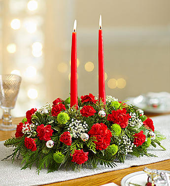  Season's greetings centerpiece - •Centerpiece arrangement with red carnations and mini carnations; green button poms; baby’s breath; assorted greenery; accented with decorative balls and red tapered candles