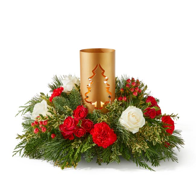 December Dreams Centerpiece Arrangement (FTD) - ‘Tis the season for gathering close with friends and family, made all the more festive with this stunning and pine-scented centerpiece at the heart of your table. Approximately 17 inches wide and 11 inches tall for the Standard size. 