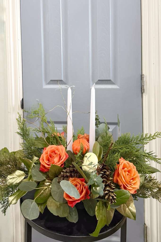 SERENITY FLORAL CENTERPIECE - Centerpiece with seasonal roses and artificial pumpkins, two centerpiece candles that will help give your centerpiece a cozy touch