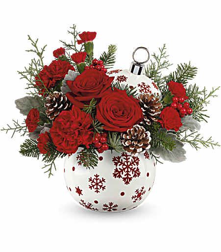 Sparkle All The Way Ornament Arrangement - Capture the essence of the sparkling heart of winter with stunning red roses and fresh pine elegantly arranged in a shimmering, hand-painted ceramic ornament jar; a gift they'll cherish forever! Approximately 13 inches wide and 11 inches tall for the Standard size.