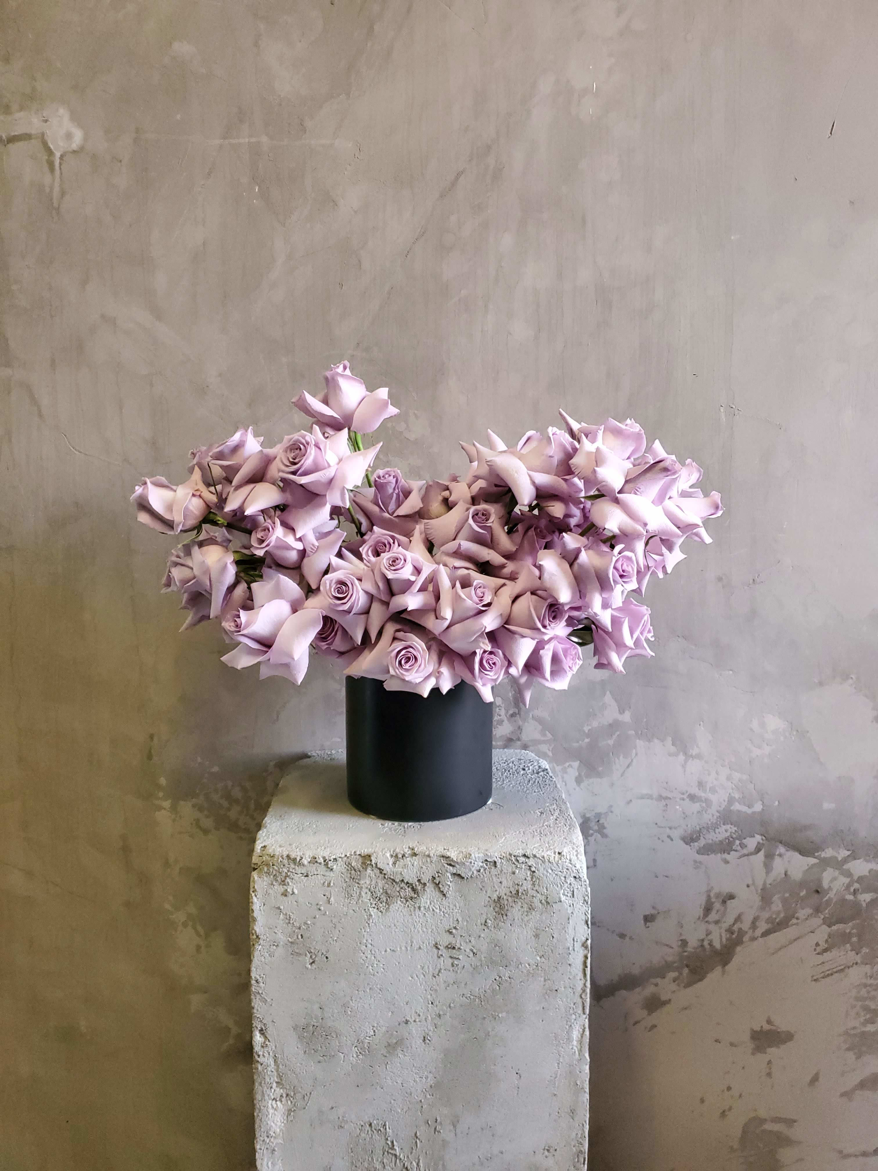 Lavenders - The beautiful yet breathless flower arrangement will be appreciated by anyone for all your occiasion.   Approximately 40 flowers make up this bubbly arrangement and it's available all season long.