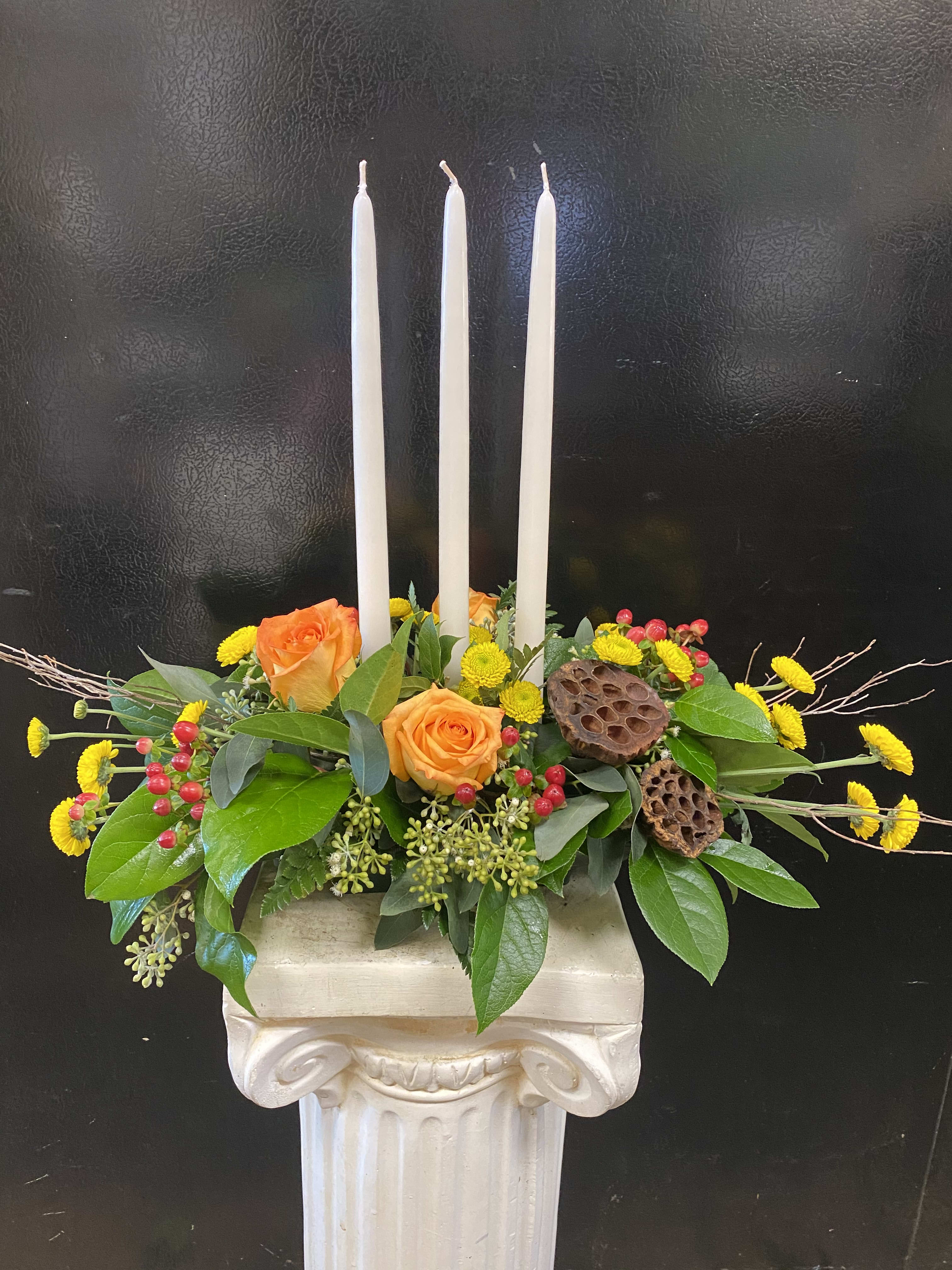 Simply Elegant Thanksgiving - Long and Low Centerpiece with 3 Candles. Flower to include Mums, Hypericum, Roses, Lotus Pods, and Birch Stix.