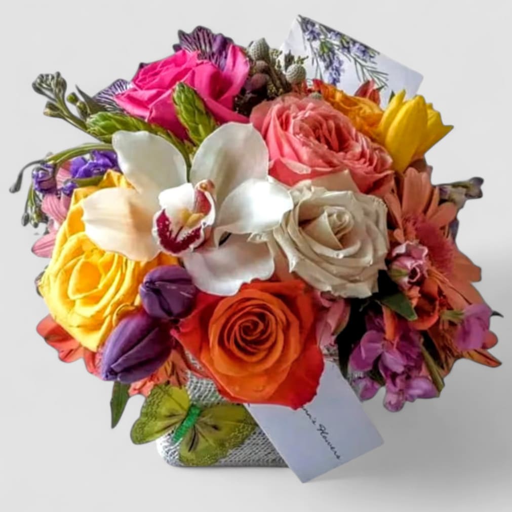 Birthday Blooms For Cherry Hill NJ Rose Beauty - Perfect for every occasion. Send them this beauty today to show them how much you care with it's mixed cheerful vibrant blossoms of that day roses orchids and more arranged in a modern glass cube vase wrapped in white jute ribbon. All fresh flower bouquets that leave my flower studio are works of art. Please visit my beautiful gallery to see my latest designs that I have created for my online customers. Send them happiness. Send them a special bouquet to make them smile today. 