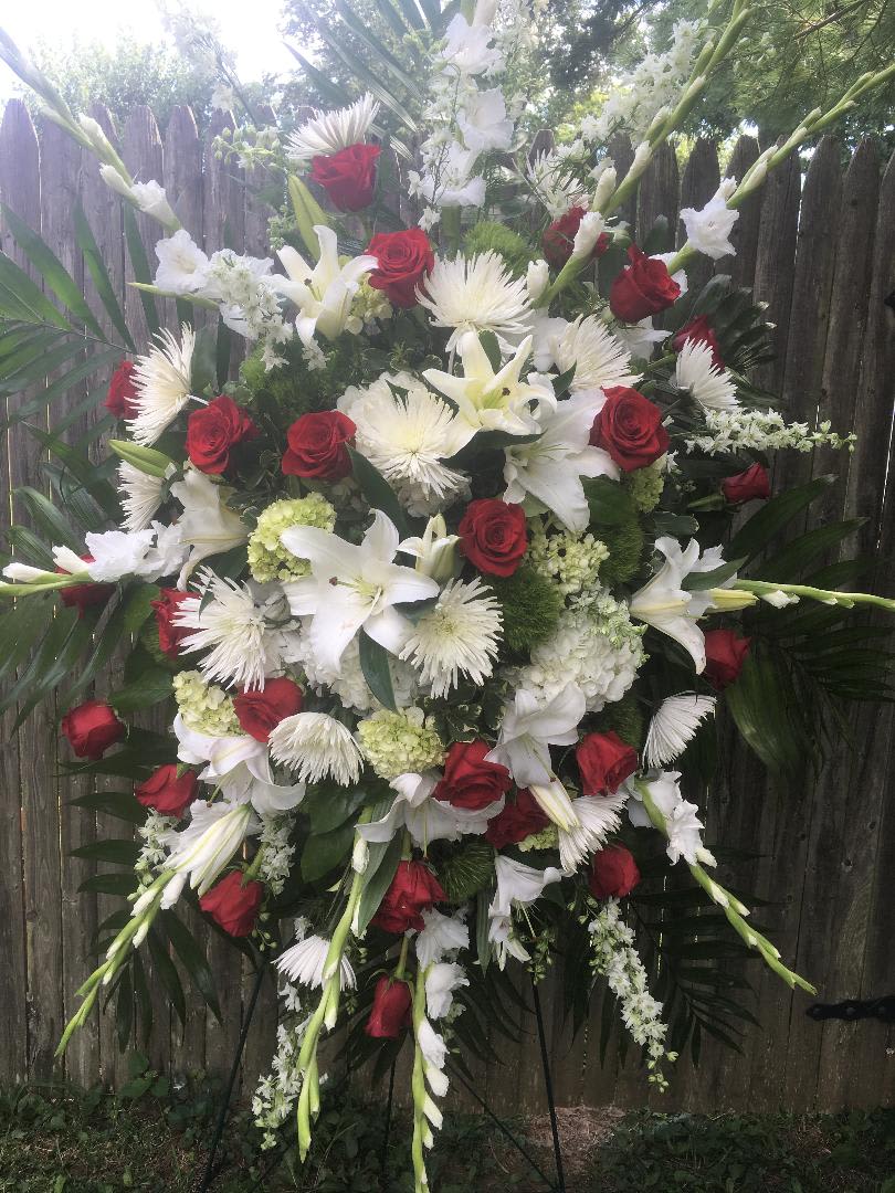 Red and White Sympathy Easel - You are forever in our hearts. Send your sympathies &amp; love with this red and white Easel Floral Piece. With Red Roses, white Lilies, Gladioles, Larkspur, Hydrangea in white and Green, white Cremone Mums etc.