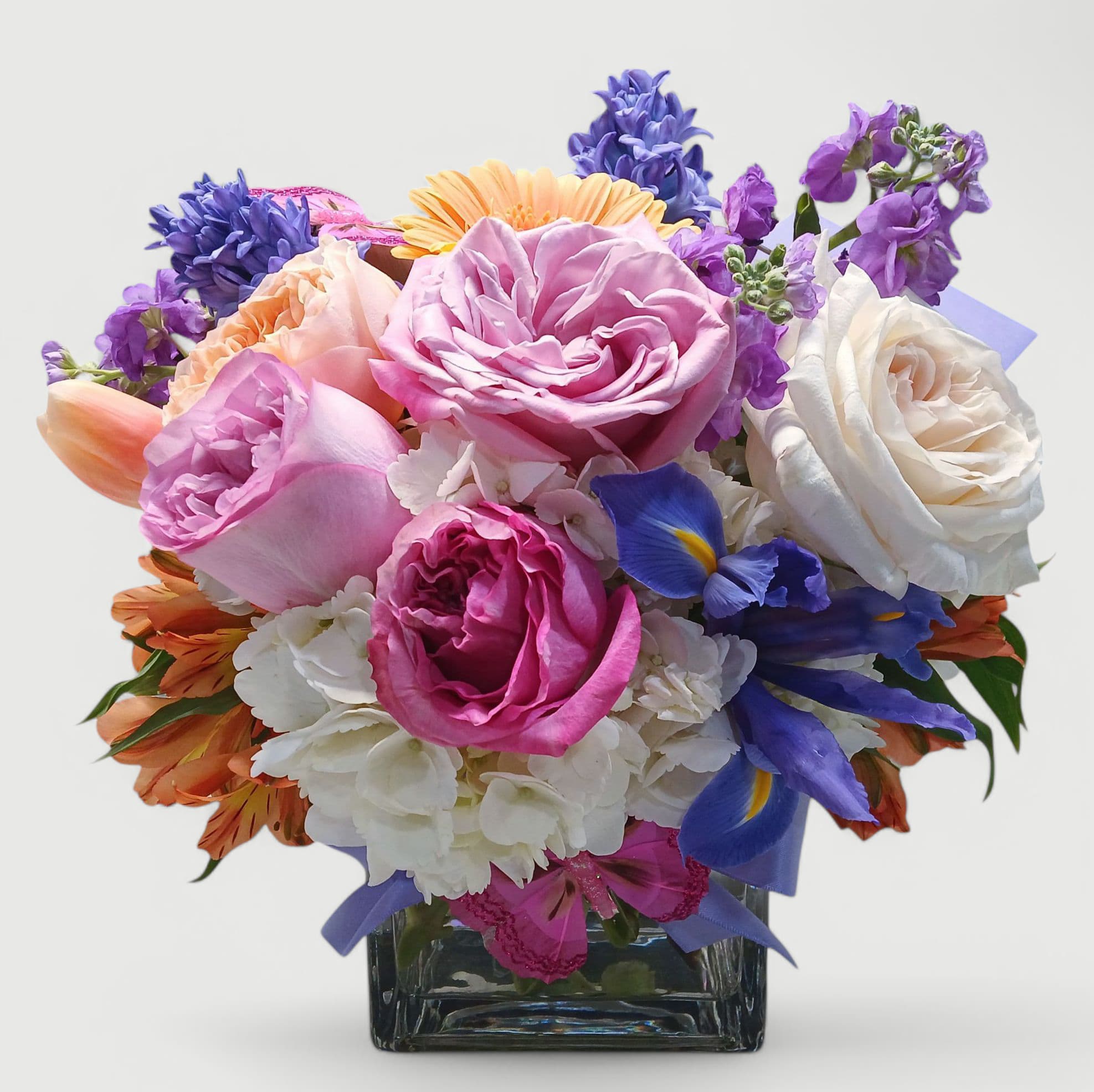 Designer's Choice Perfect Bouquet - Send this beautiful fresh bouquet today to let them know how much you care with it's lovely mixed blossoms like pink and lavender roses white hydrangeas purple stock and so much more arranged in a sleek modern glass vase adorned with a sweet cheerful pink butterfly and lavender satin bow! Just perfect to send for every occasion. Always made extra special and unique each time. Send happiness today. Flower delivery to Haddon Township, Haddonfield, Haddon Heights, Cherry Hill, Marlton, Mount Laurel, Moorestown, Voorhees and local South Jersey towns. Same day delivery. Please feel free to tip our delivery drivers for their hard work so that we can continue to serve you our excellence. Thank you.