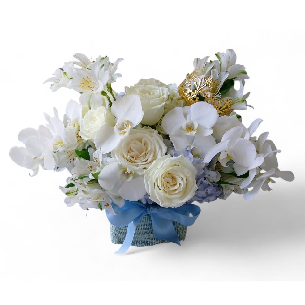 Blue Mint Rose Beauty - Special bouquet for a special someone. Roses orchids hydrangeas and more arranged in a modern glass cylinder vase wrapped in soft blue jute ribbon. Perfect for a birthday get well and all occasions to show them that you care. Send happiness today.