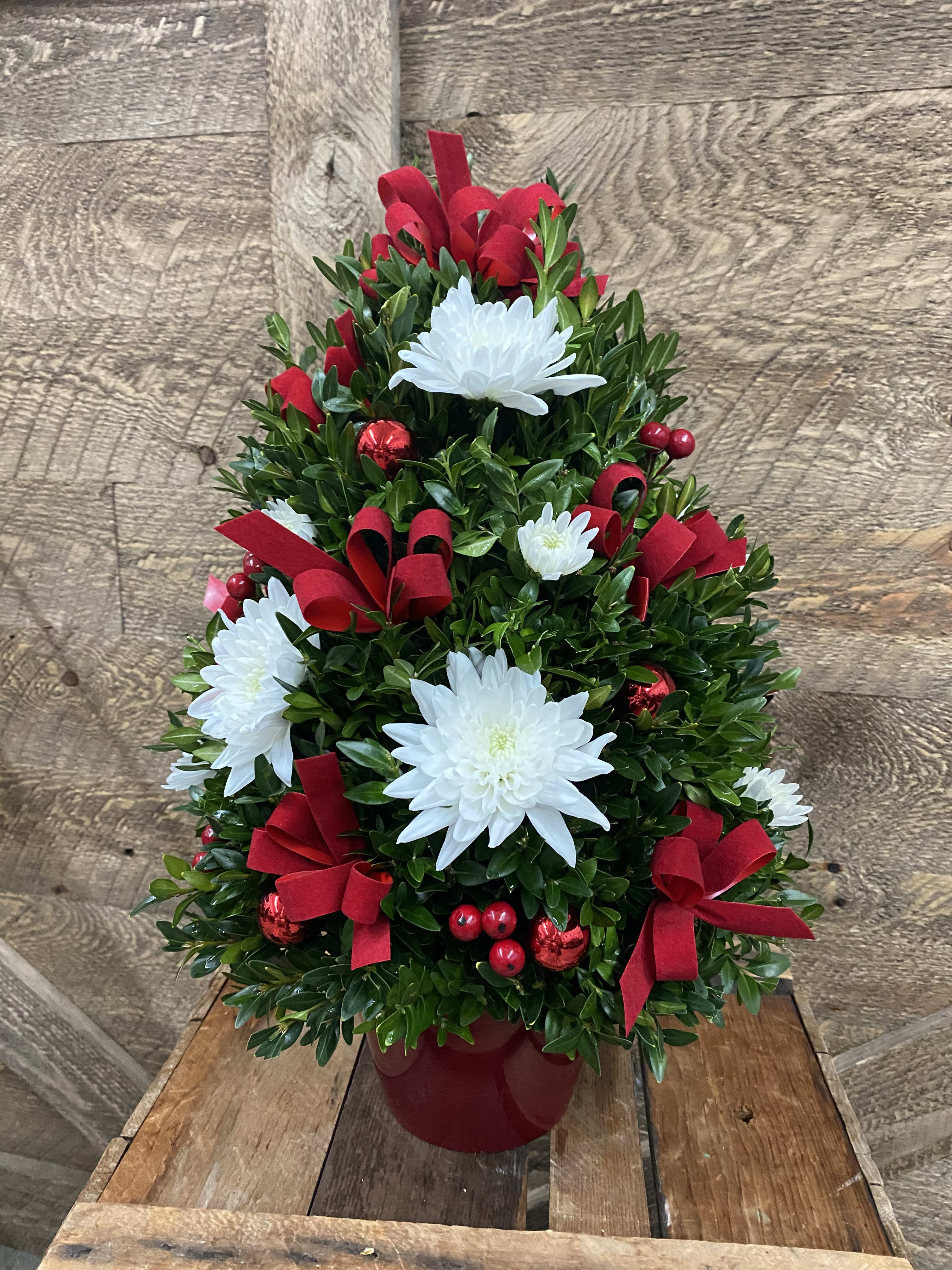 Ohh Christmas Tree - This adorable mini boxwood tree arrives decorated with ornaments, bows and fresh flowers. A perfect gift for anyone who has everything. Let us know if you have any color specifics. 