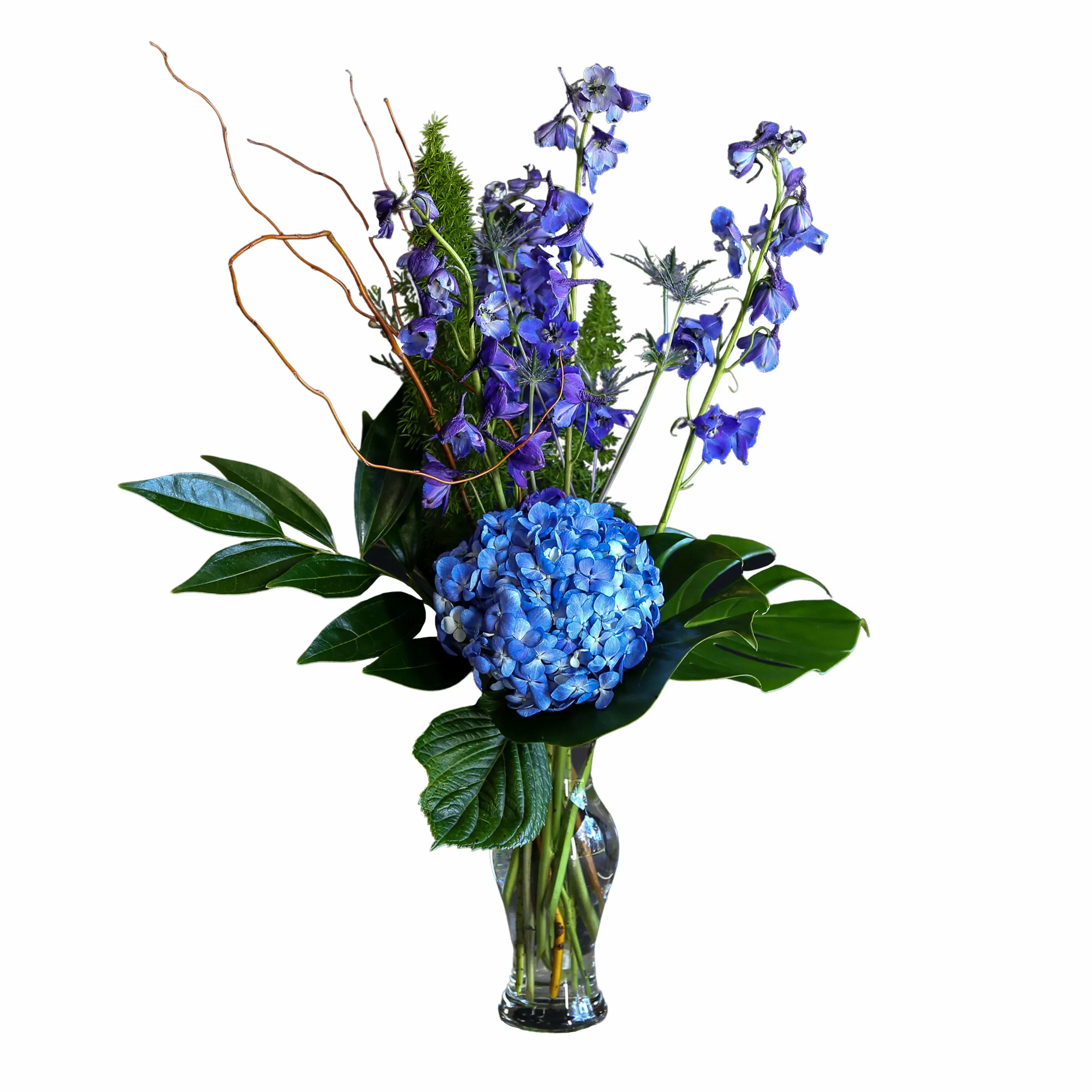 Awaken - TMF-1704 - A new day is dawning.  Awaken will refresh the soul.  Flowers like blue hydrangea make an uplifting statement sure to please.  Standard 27&quot; tall x 20&quot; wide