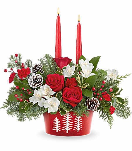 Evergreen Charm1 - Glow up your holiday table with Teleflora's Evergreen Charm Centerpiece. Red roses, white alstroemeria, and evergreens shine in Teleflora's Snowy Pines Dish with glowing red candles-perfect for Christmas dinners or winter celebrations.