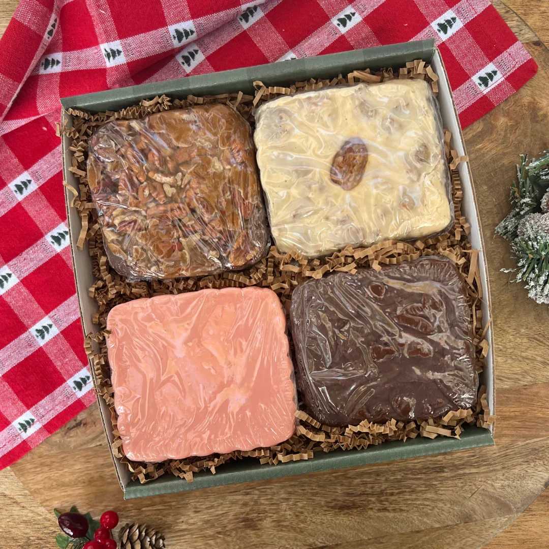 Christmas Fudge - From Augusta Gift Baskets, Gift the rich, creamy goodness of our hand-crafted Still Creek Kitchen fudge—the perfect treat for spreading holiday cheer. This luxurious gift is a delightful mix of classic and creative flavors and sure to sweeten anyone’s day!