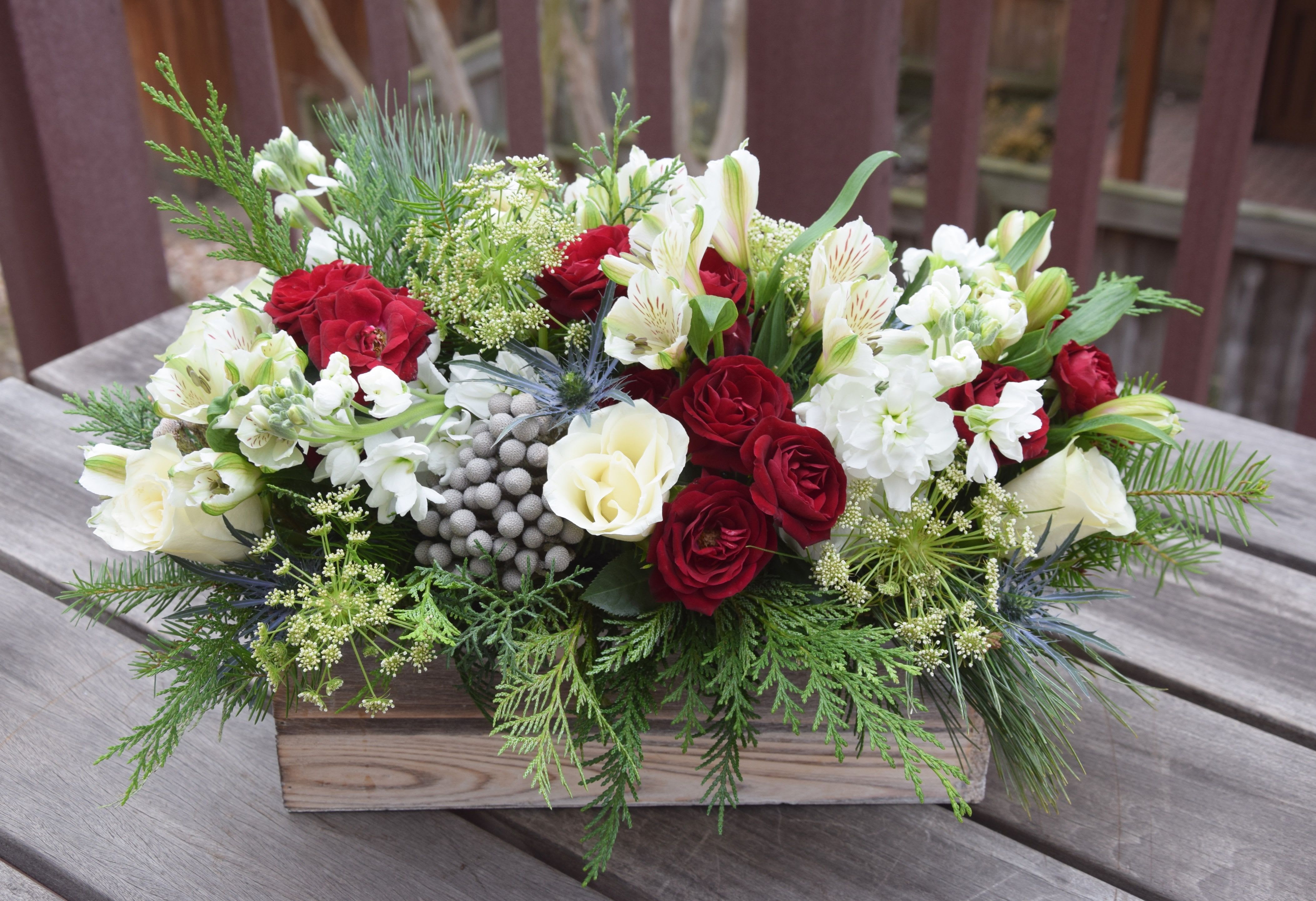 Christmas in the Country - A festive celebration of flowers in a beautiful rustic wooden box. A lovely way to dress up a holiday table or a beautiful gift for a loved one. 
