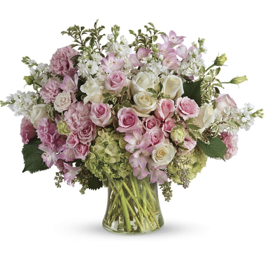 Beautiful Love Bouquet - Show them how beautiful your love is with the Beautiful Love Bouquet! This breathtaking bouquet features green hydrangea, pink roses, white roses, pink spray roses, light pink alstroemeria, pink lisianthus, white stock, fresh greens, and seeded eucalyptus, all designed in a large clear gathering vase. 