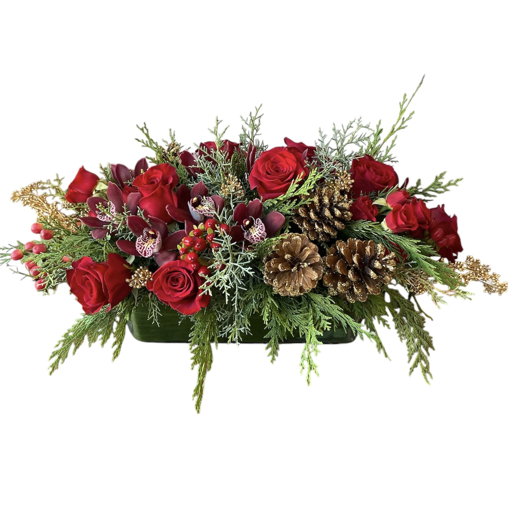 Christmas Table Centerpiece  - Christmas greens and red flowers designed as shown in photo. 