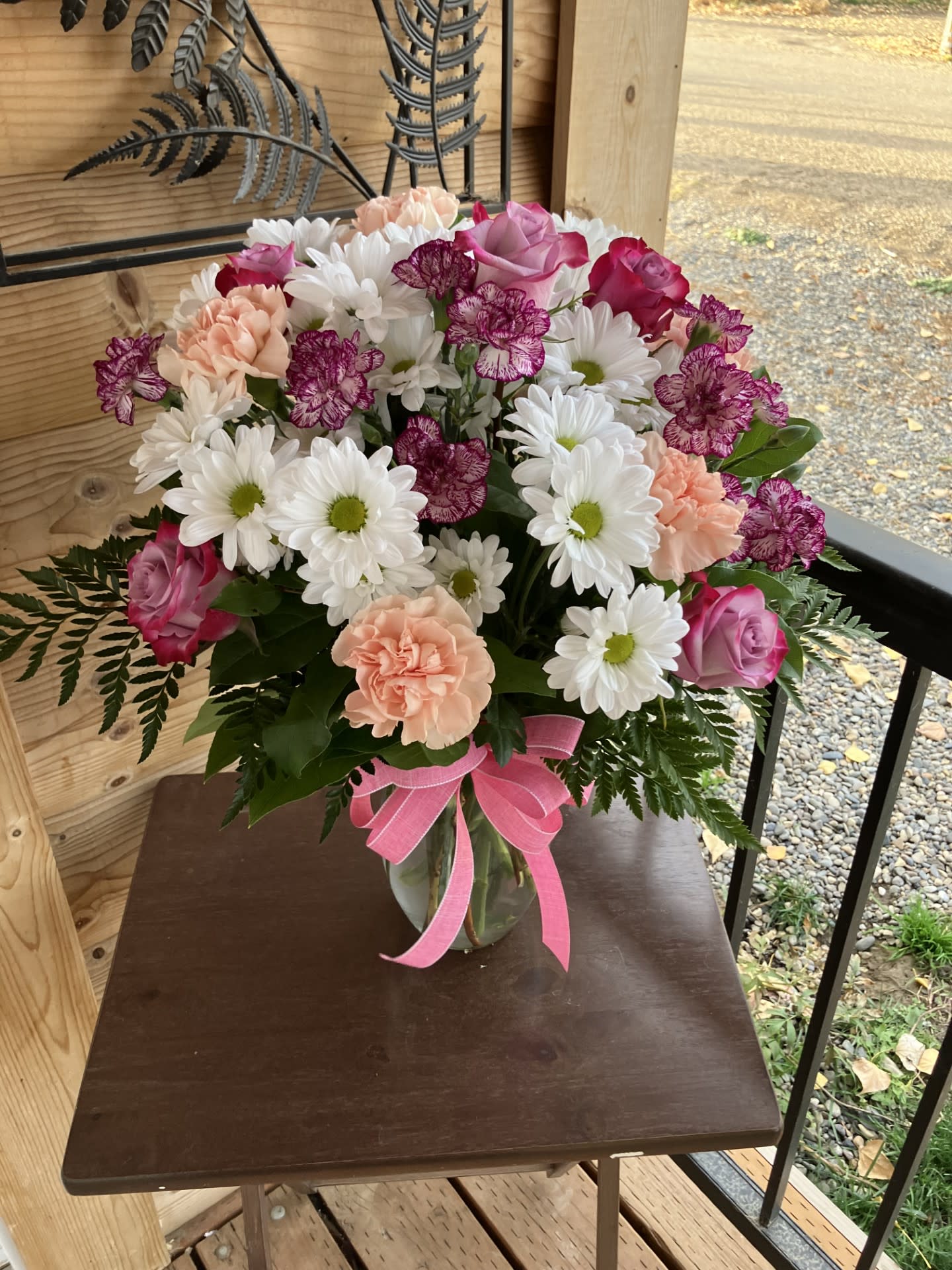 Lazy Pink Daisy - Daisies, Carnations, and Roses. This arrangement could be used for a birthday, just because, or for any occasion that would fit your needs!