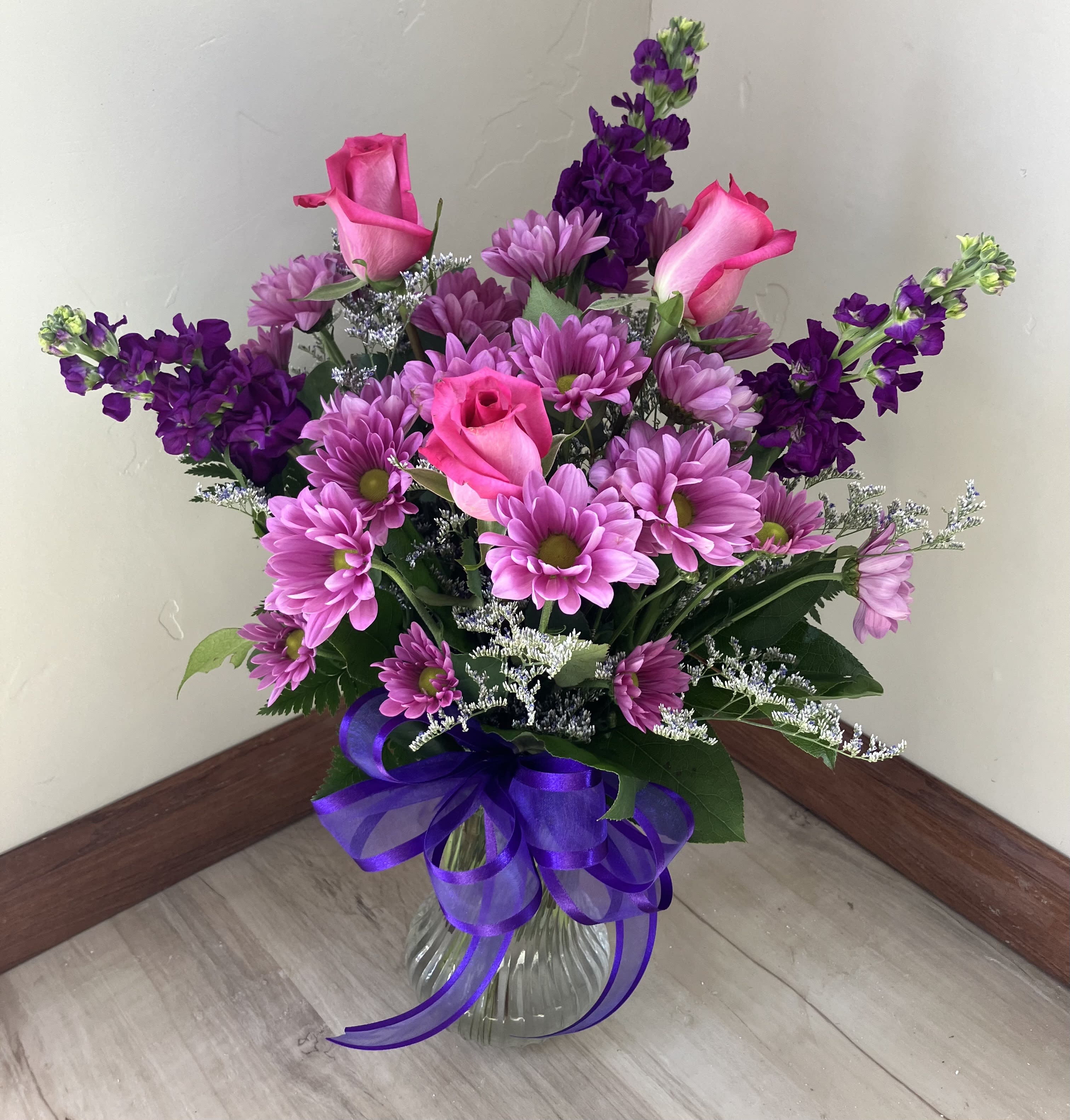Purple Punch - Brighten anybody's day with this beautiful arrangement. This arrangement can be used for the occasion of your choice!      