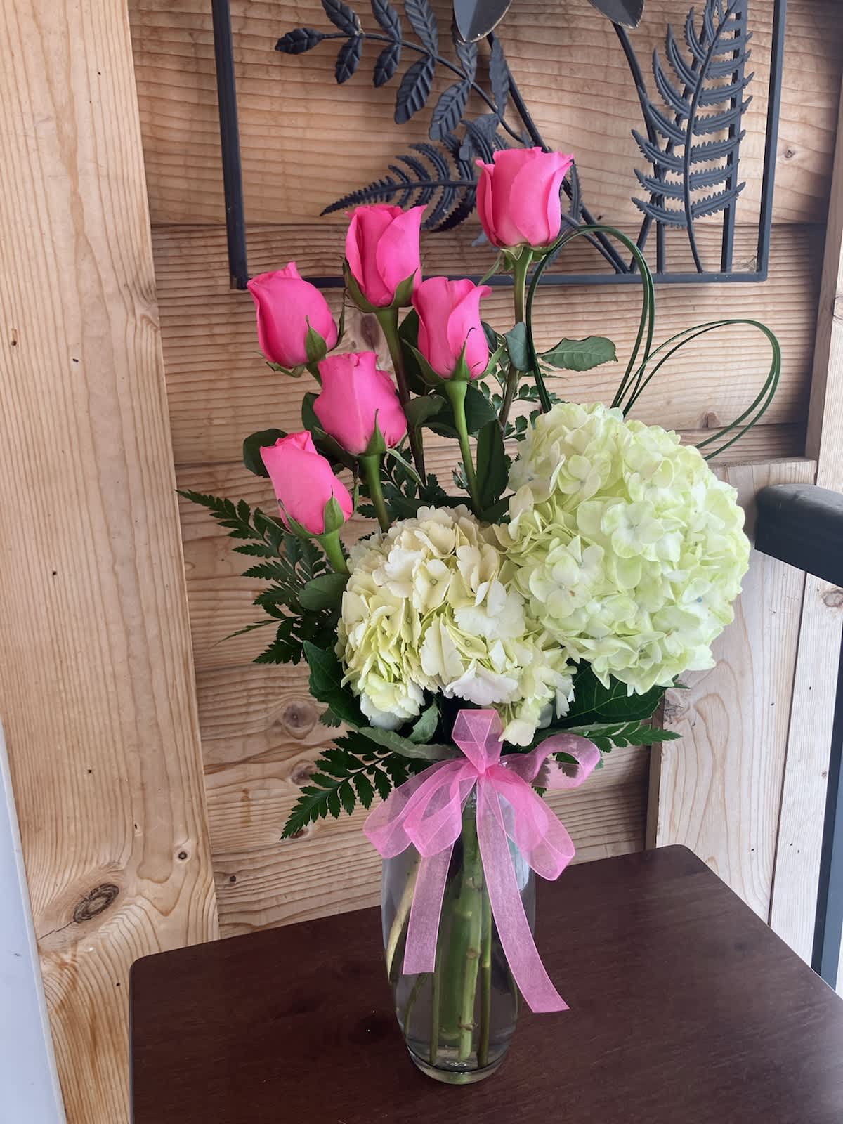 Roses &amp; Hydrangeas - Cute arrangement with a half dozen of bright pink Roses and fluffy Hydrangeas.