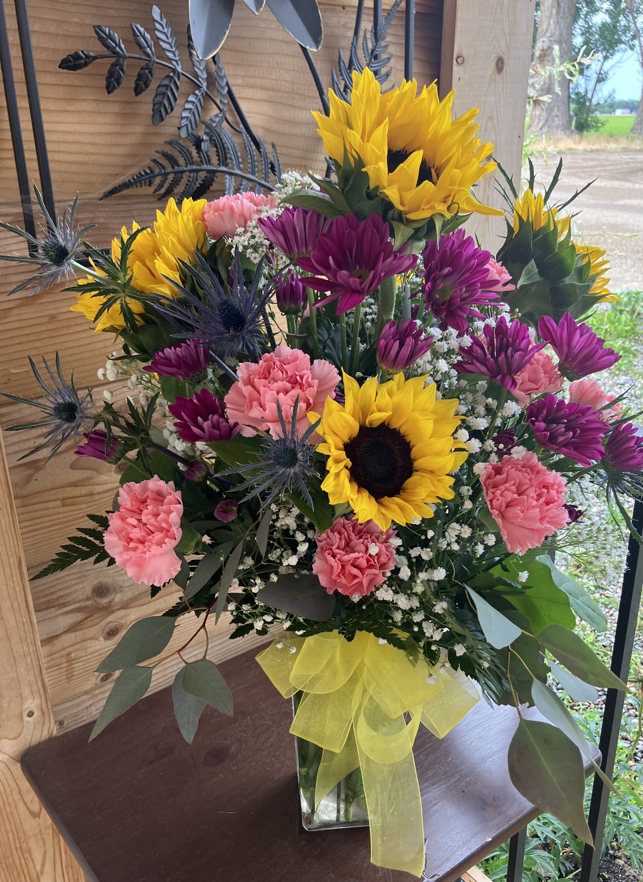 Sunflower Delight - This bouquet with sunflower will brighten up any room! It can be used for a birthday, just because, or for the occasion of your choice!