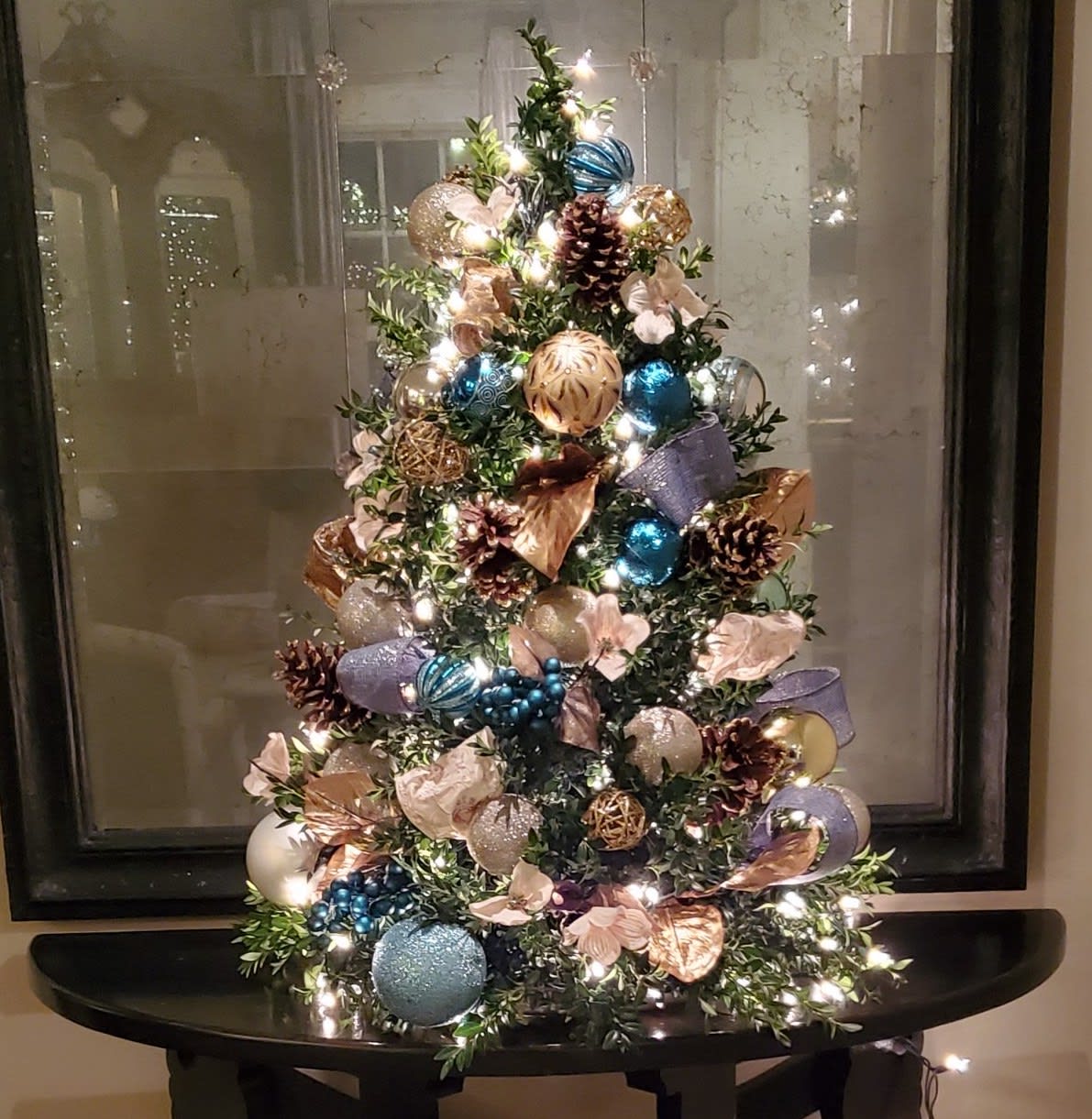 St. Nick - Boxwoods for Christmas? Yes please! Display these beautiful, lit up and decorated mini trees indoors or outdoors.