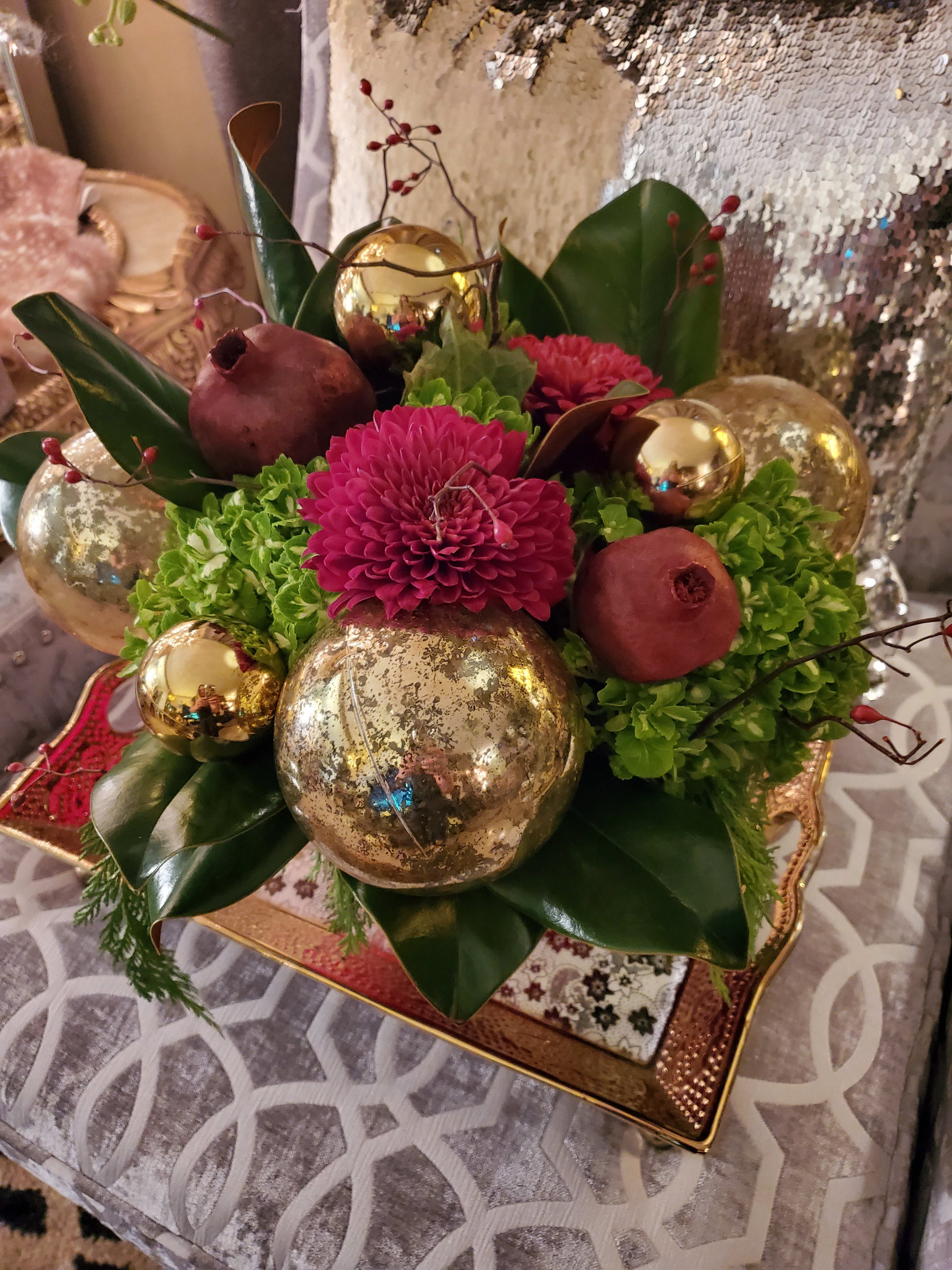 George Harrison - A gorgeous holiday arrangement of mums, hydrangeas, berries, pomegranate and Christmas ornaments.