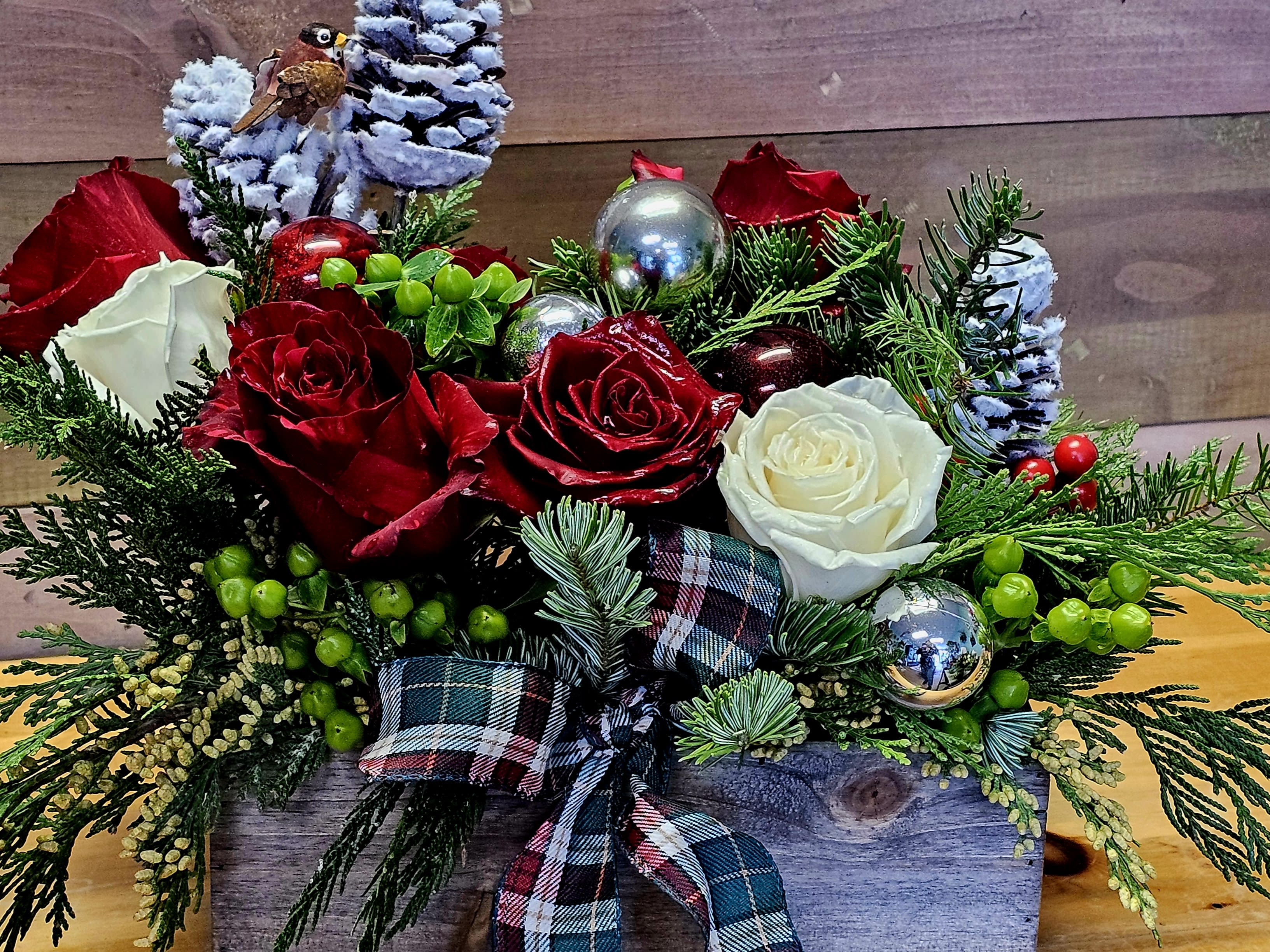 Holiday Joy - Holiday arrangement in wooden box, with roses, greens *white box is not guaranteed.* flowers my vary.