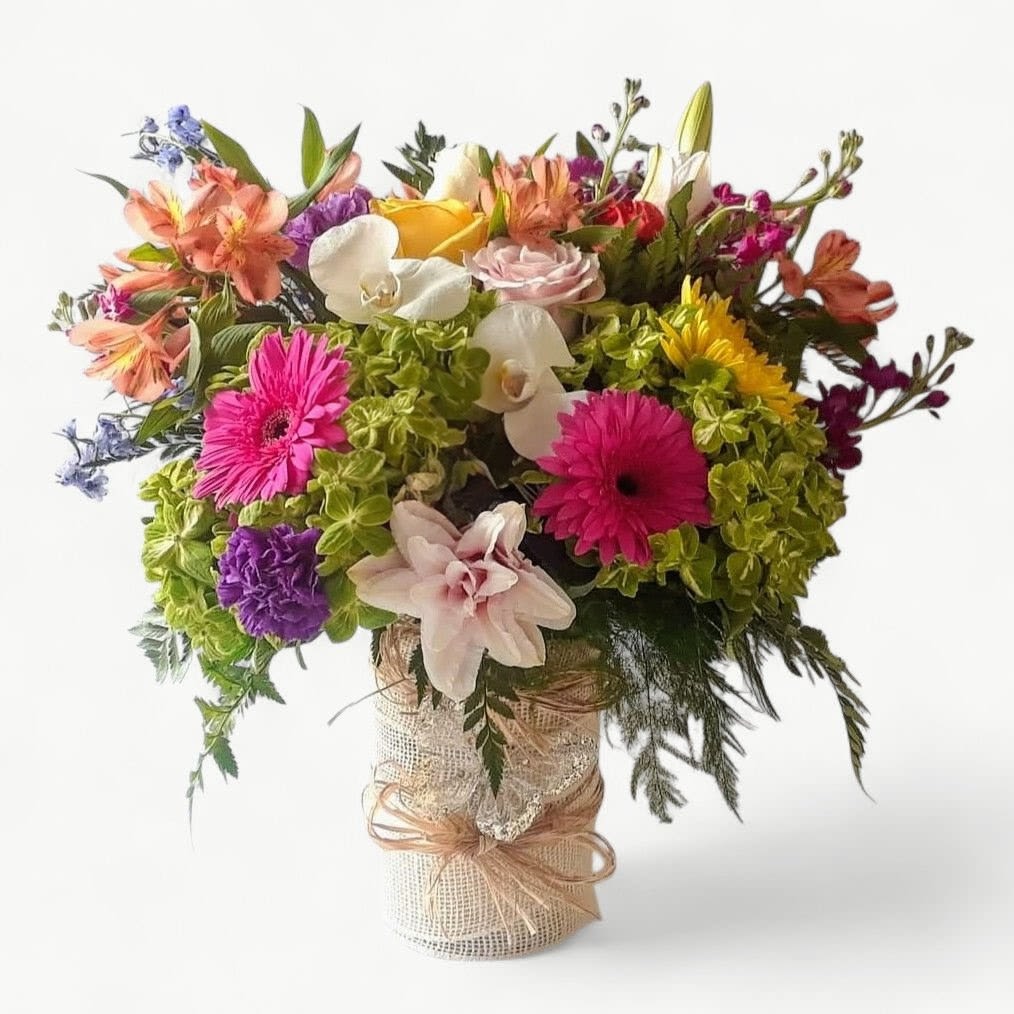 Luxe Blossoms Beautiful Bouquet - Send this beautiful lush blossoms bouquet today to let them know that you care with it's lovely mixed seasonal flowers such as premium roses, lavish hydrangeas fragrant stock and more arranged in a tall modern vase wrapped in my signature style with vanilla jute raffia and butterflies. Make their day extra special.