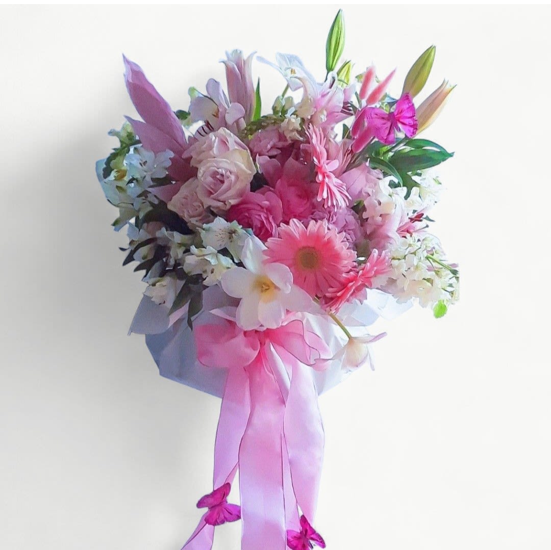 You're So Pretty Pink Bouquet - Pretty all pink and white seasonal bouquet filled with premium pink roses, lavish hydrangeas, fragrant stock  cheerful daisies, elegant orchids and so much more wrapped in my signature style with long flowing ribbons and butterflies. Send beautiful.