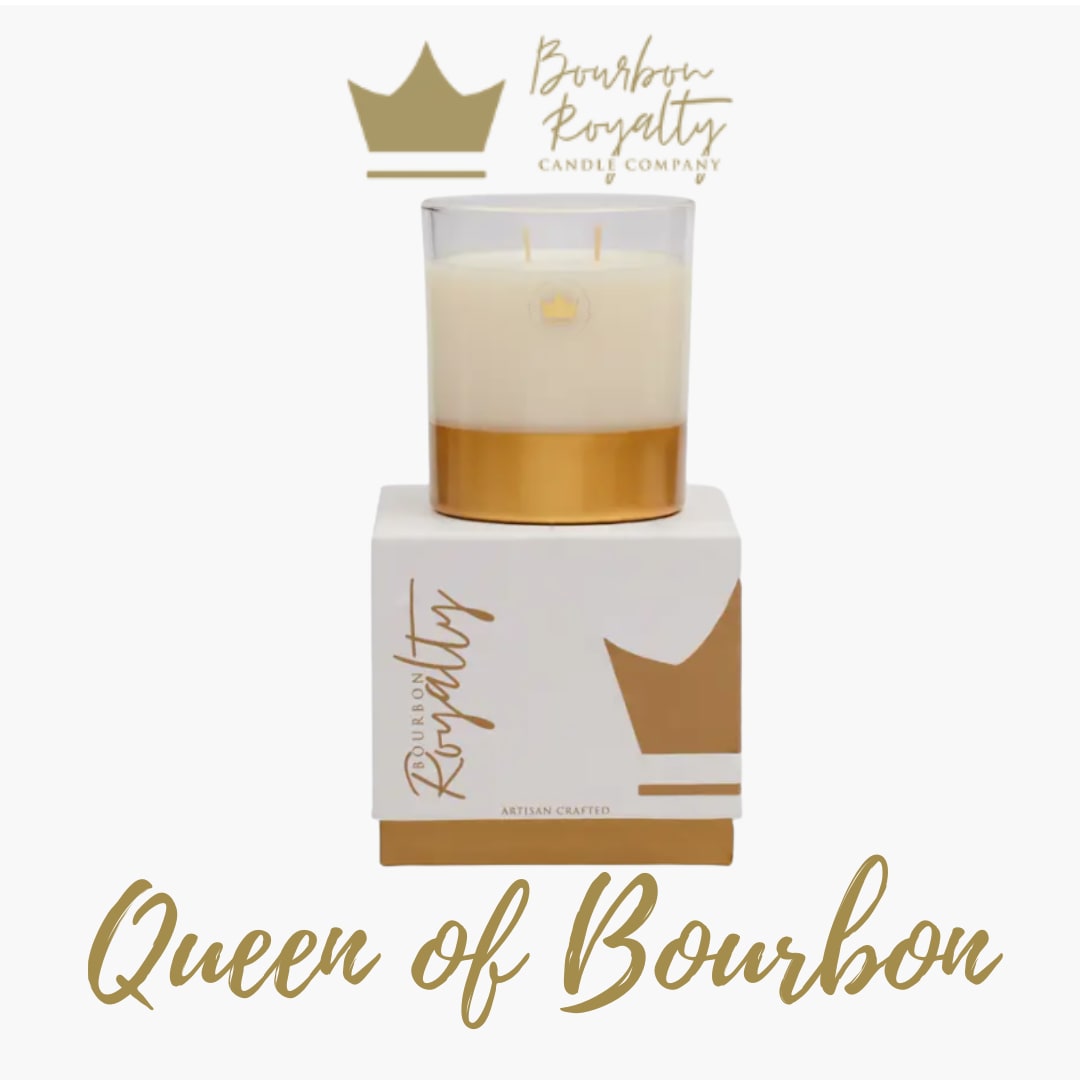 Bourbon Royalty - 14oz Boxed Glass Candle - Queen of Bourbon - Beautifully boxed this candle is the perfect ready made gift to accent any arrangement large or small.   From the Makers: Elegantly gilded with the Bourbon Royalty crown, this candle exudes opulence. Being double wicked, it burns for 45-55 hours, casting a warm, captivating glow. Housed in a custom box, it's a perfect gift or a luxurious addition to your space. Elevate your ambiance with this regal masterpiece.  ****PLEASE NOTE**** We are unable to deliver this candle by itself. If only looking to purchase the standard level of this candle, it can be picked up in store. Our Minimum for Delivery is $50. If the items in your cart total over this amount (for example, the candle and a floral arrangement) we can deliver it.