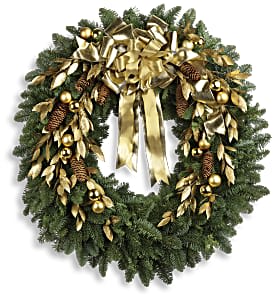 Glitter &amp; Gold Wreath Deluxe - When it comes to saying &quot;Merry Christmas,&quot; this wreath offers a golden opportunity to say it in style! An elegant noble fir wreath is adorned with yards upon yards of gold ribbon, gold ornaments, pinecones and more. Perfect for your own house, or the home of a loved one. In this case, all that glitters really is golden! Approximately 30&quot; W x 30&quot; H  