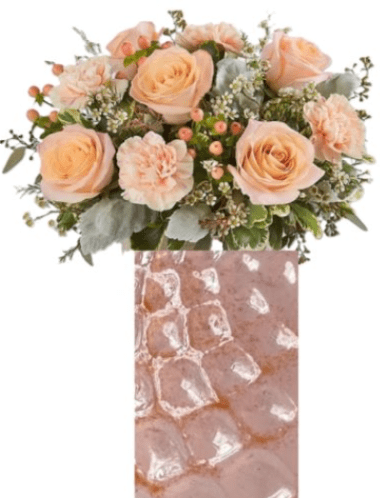 Peach Bellini (2 Left - Dont miss out) - When juicy, ripe peaches start showing up at farmers' markets, there's not a better time to grab some and blend up a batch of peach Bellinis! The perfect balance of sweet, tart, and bubbly. This floral arrangement is designed in a beautiful peach glass honeycomb design mason jar that represents the bubbles in the bubbly. The Shimmer roses are sweet, while the Hypericum berries are tart! What a way to celebrate!