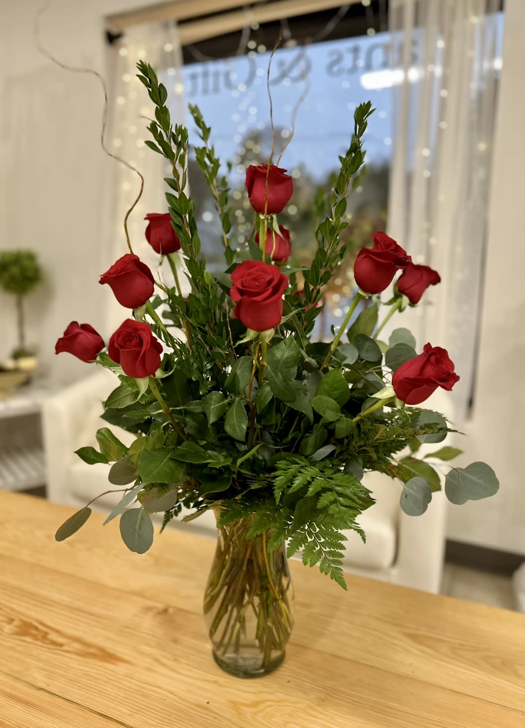 One Dozen Premium Red Roses by Westford Florist Art by Veny - Roses are red, violets are blue, these premium red roses arranged by Westford Florist Art by Veny will surely woo you! Elevate the romance with our One Dozen Premium Red Roses vase arrangement - a classic and sophisticated gift perfect for Valentine's Day, anniversary, birthday or just because. Want to spice things up? Ask about mixing in some yellow roses for a colorful twist! Surprise your special someone with this stunning bouquet by Westford Florist Art by Veny that is sure to make their heart skip a beat. Say &quot;I love you&quot; in the most beautiful way possible – order now! APPROXIMATE DIMENSIONS: 25&quot; H X 18&quot; W