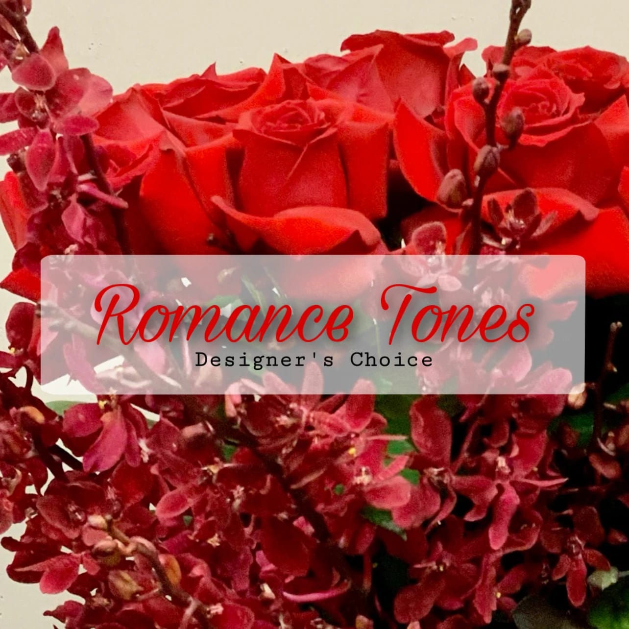 Romance Tones - Designer's Choice - Romance Tones - Designer's Choice. Rich, bold, and timeless, this Deep Red Flower Arrangement showcases the dramatic beauty of flowers in luxurious crimson tones. Lush blooms are artfully gathered to create a striking display full of passion and elegance. Whether used as a romantic gesture, a sophisticated centerpiece, or a statement of admiration, this arrangement brings depth, warmth, and unforgettable charm to any setting.  