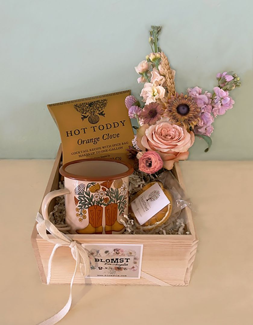 The Cozy Box - A lovely Gift box for the colder months, full of golden warmth and coziness. A vintage prairie style enamel cup with boots and flower motif, Hot Toddy Orange clove spice bag (makes up to one gallon hot toddy. Rum or whiskey can be added to the orange cinnamon and clove spices), a bag of organic fresh dried orange slices, so beautiful as decoration. A mini Blomst bunch of natural, seasonal stems. The fresh flower bundle will be wrapped with water  and will keep fresh. Placed in a handmade wooden box, 9&quot; by 9&quot; by 4&quot;. Very cute Gift for all occasions, ready for hand delivery in LA.  