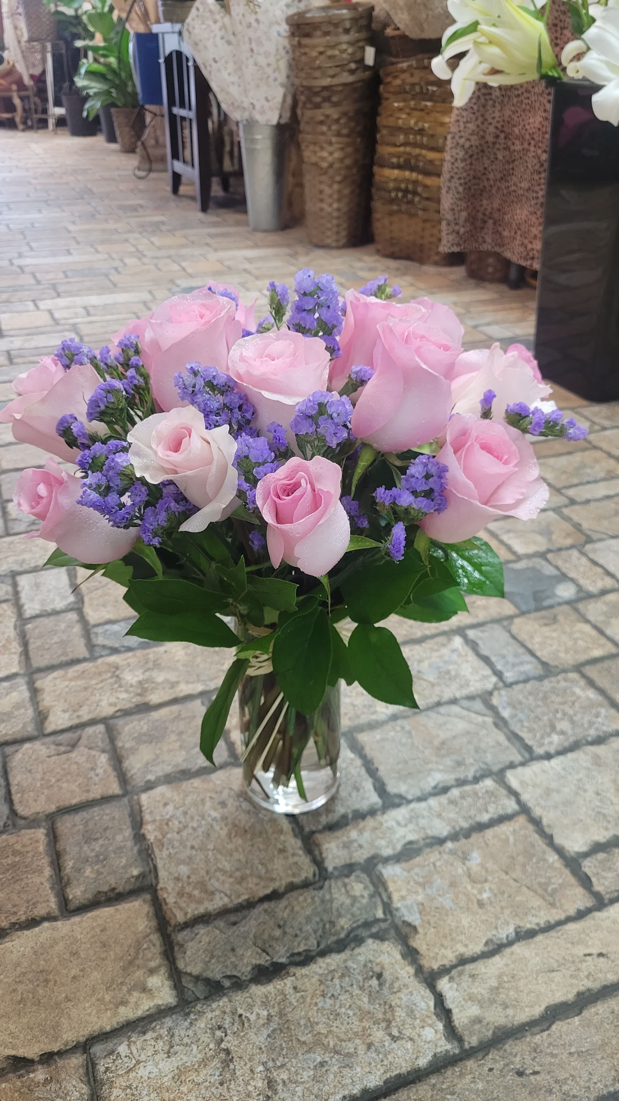 Scented Love - Surround yourself with the sensual allure of our Scented Love bouquet, a masterpiece of fragrance and beauty. 12 pink roses with purple ascents 