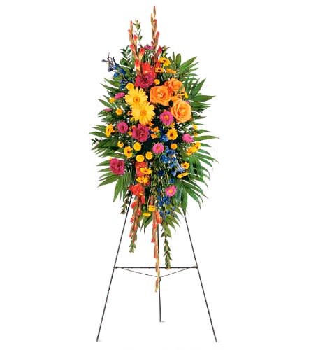 Celebration of Life Standing Spray - TF203-8 - This colorful standing spray will express your compassion to all in attendance. One standing spray arrives with orange gladioli and roses yellow gerberas hot pink asters and foliage accents on an easel.Approximately 18&quot; W x 46&quot; H Orientation: One-Sided As Shown : TF203-8