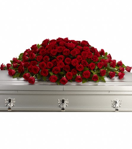 Greatest Love Casket Spray - T223-1A - A loving embrace of rich regal roses in an all-red spray to adorn the casket. A full spray of crimson roses alternating large with slightly smaller.Approximately 62&quot; W x 22&quot; H Orientation: N/A As Shown : T223-1A
