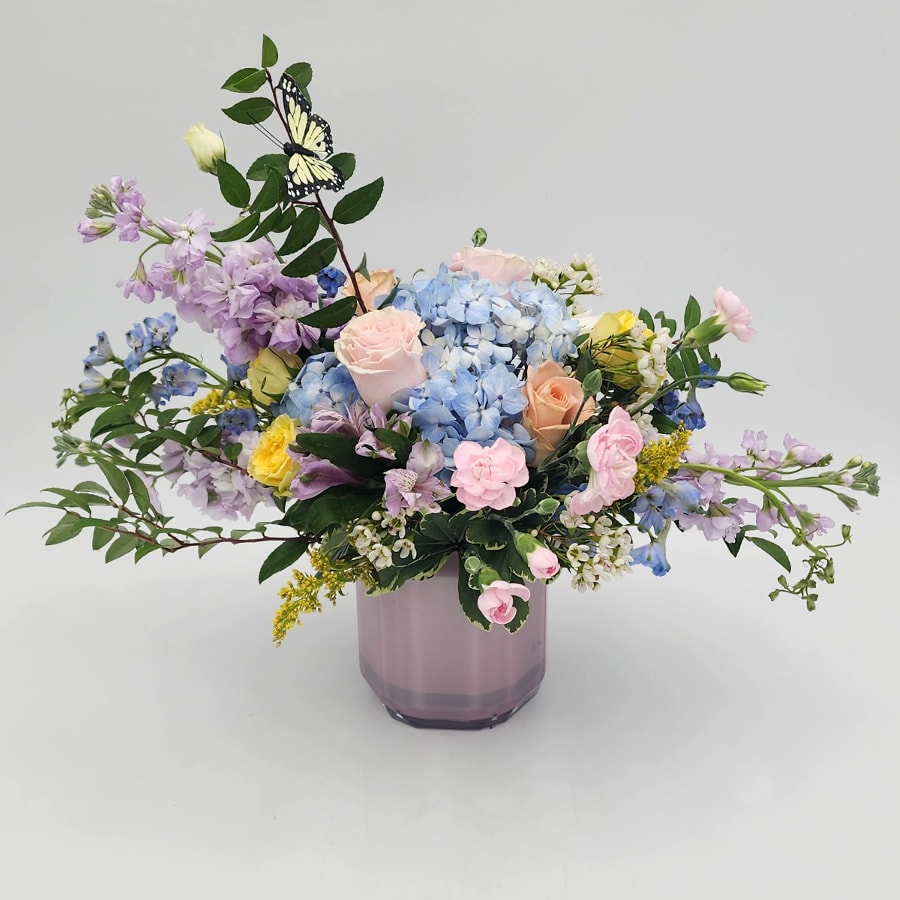 New Birth by Lynn - A whimsical Pastel bouquet with a butterfly perfect for a Spring or welcoming new life!