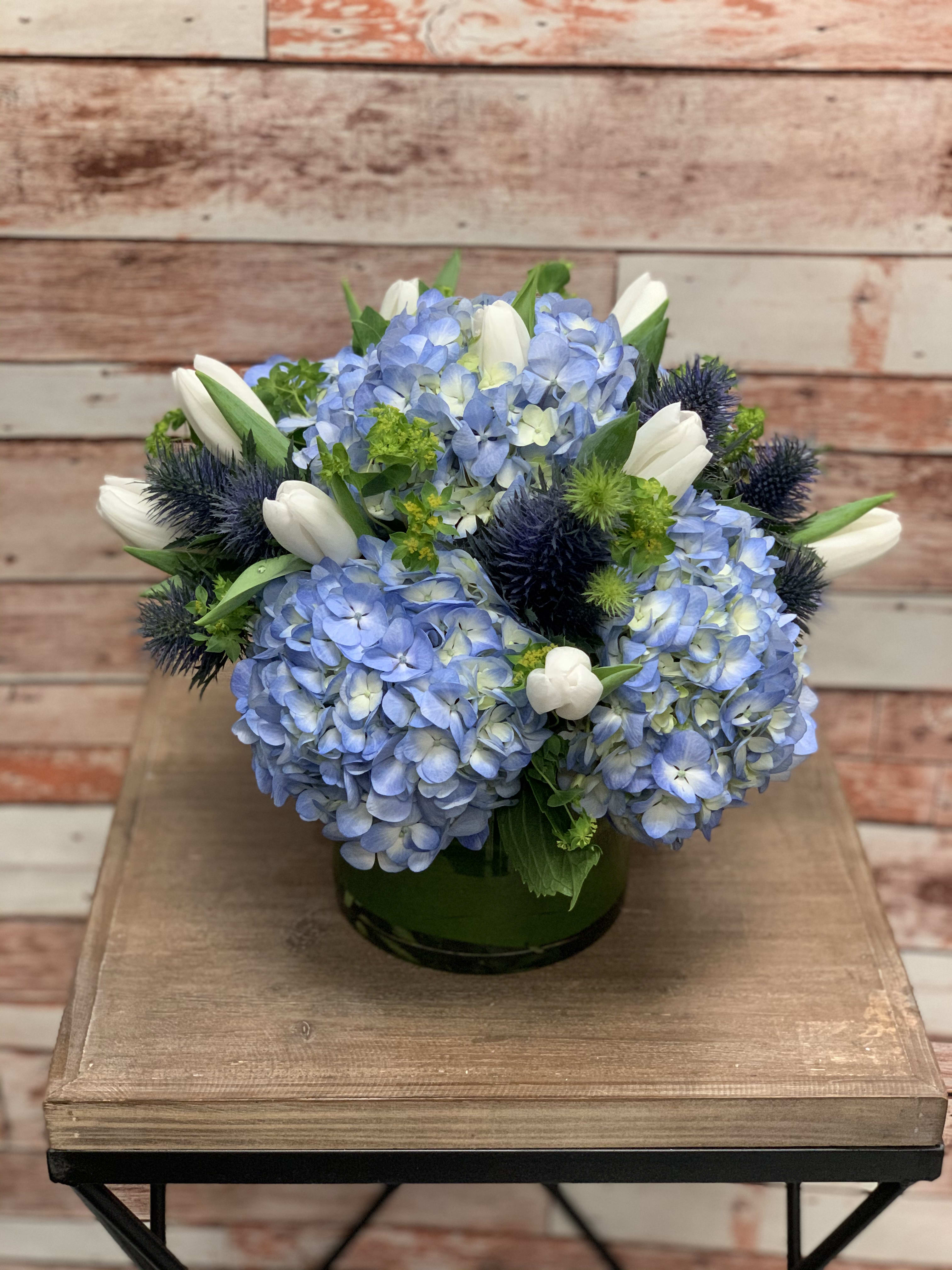 Chase the Blues Away  - An arrangement full of a variety of blue! This arrangement will surely brighten someone's day and chase the blues away!