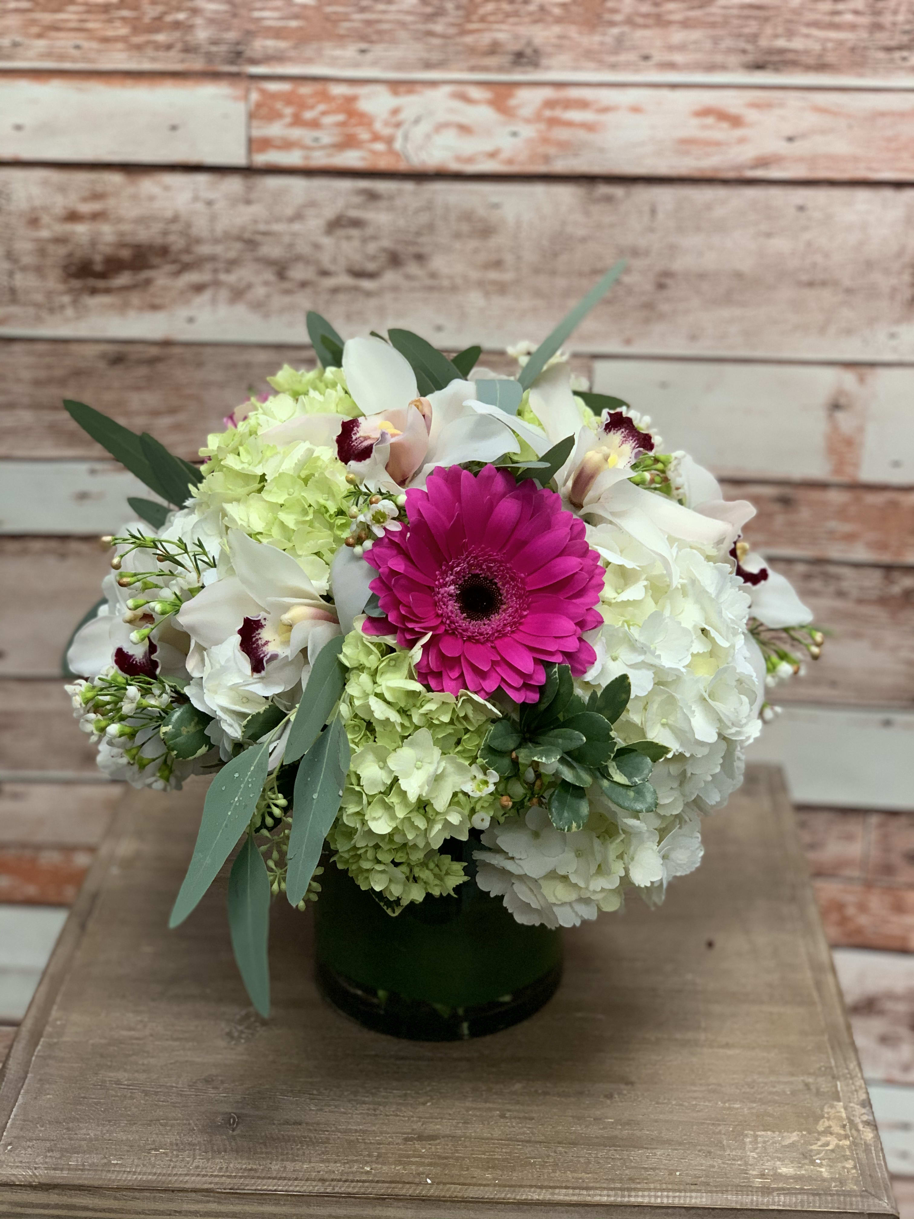 Pop of Pink - A bright white arrangement with a pop of hot pink! Bright and cheerful and destined to put a smile on anyone's face!