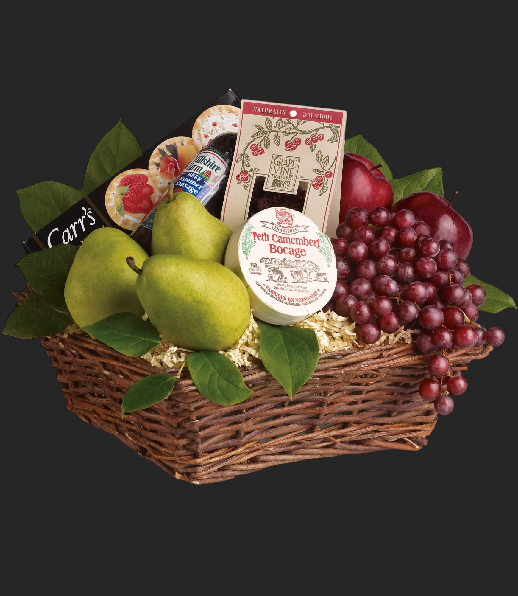 Delicious Delights Basket - It's delicious. It's delightful. It's a foody dream come true. Full of fruit, fun and more, this is a perfect gift for any occasion.    Red apples and grapes, pears, yummy dried cranberries, cheese, summer sausage and crackers are all wrapped up in a wicker basket and ready to be enjoyed. Deliciously different!    Approximately 16&quot; W x 12&quot; H      Please note: All of our bouquets and gift baskets are hand-arranged and delivered locally by professional florists. This item may require additional lead time so same-day delivery is not available.    Orientation: N/A    As Shown : T107-2A  Deluxe : T107-2B  Premium : T107-2C