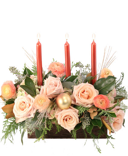 CALMING PEACH ROSES CENTERPIECE  - A beautiful centerpiece to light up the holidays, Calming Peach Roses is a lovely mixture of Mother of Pearl Roses, peach Ranunculus, and antique green hydrangeas. With these elegantly beautiful holiday flowers, they're sure to celebrate like never before! Send these peachy flowers to someone you love for the holidays. 