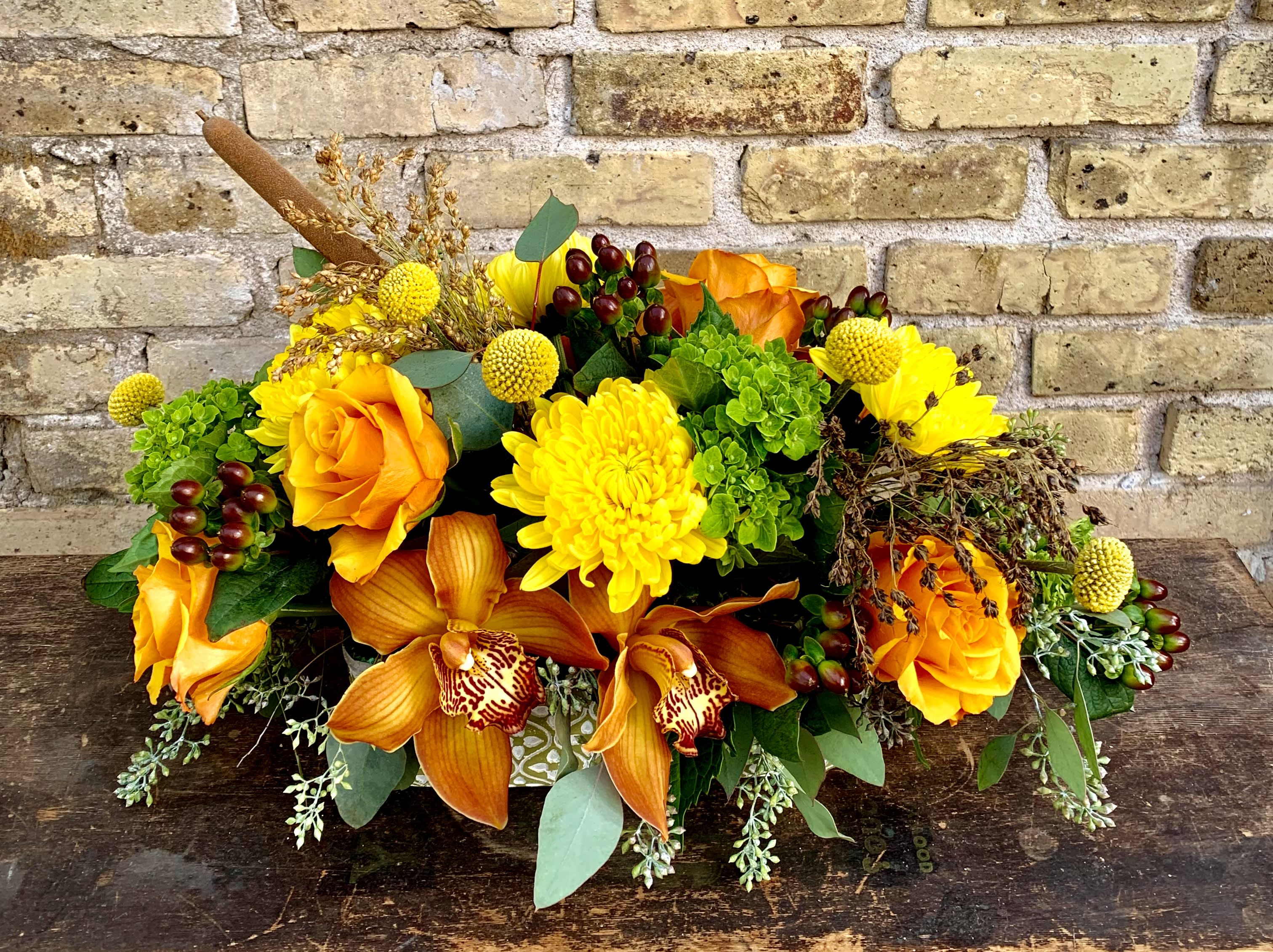 Gratitude - A Lovely Centerpiece in Fall Tones Using Mini Green  Hydrangea, Roses, Hypericum, Cymbidium Orchids and Mums. Make Your Table Look Beautiful ! Some flowers may very depending on availability.