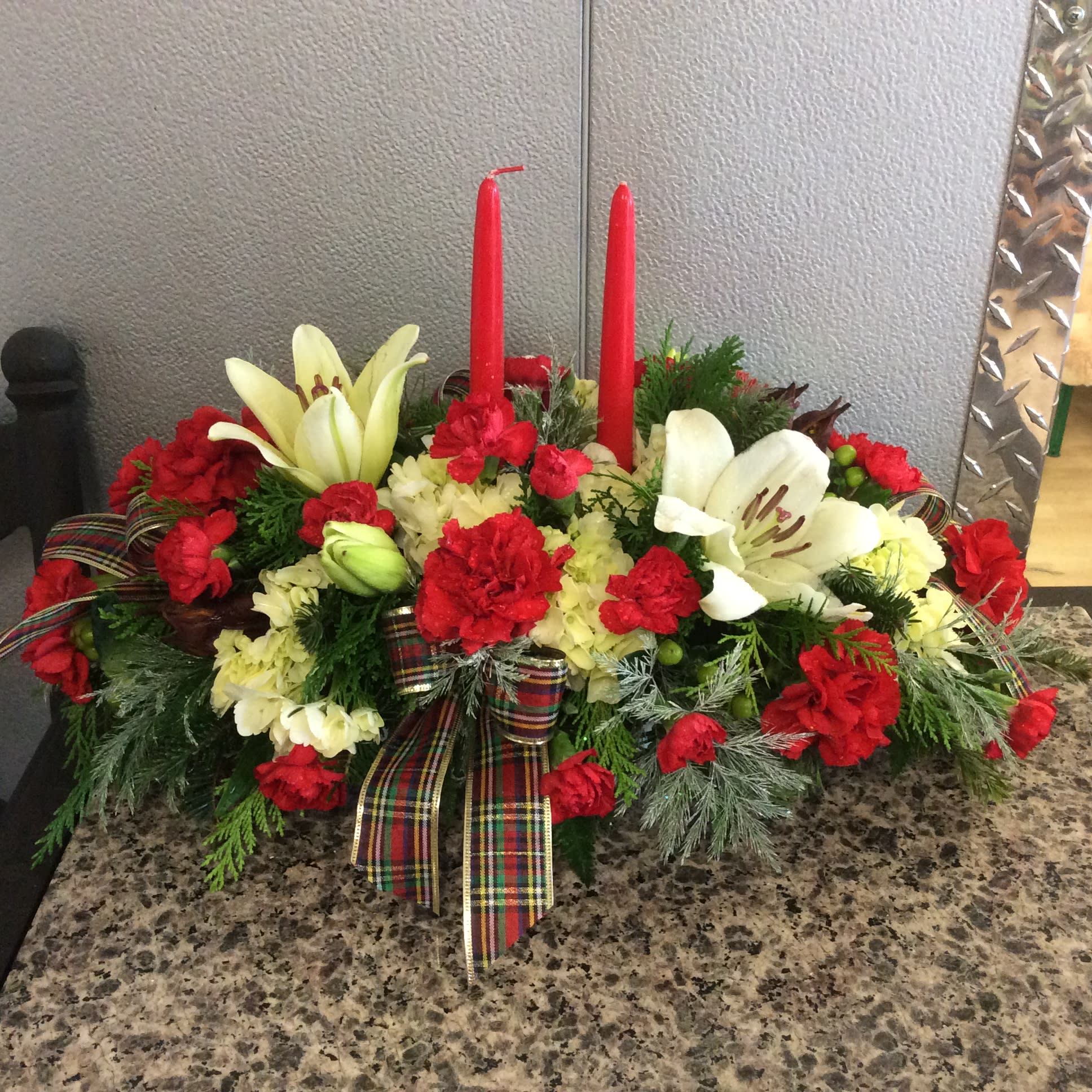 Xmas Centerpiece 25 - Lilies, hydrangeas, carnations, tree fern &amp; pine arranged w/ 2 candles in centerpiece style
