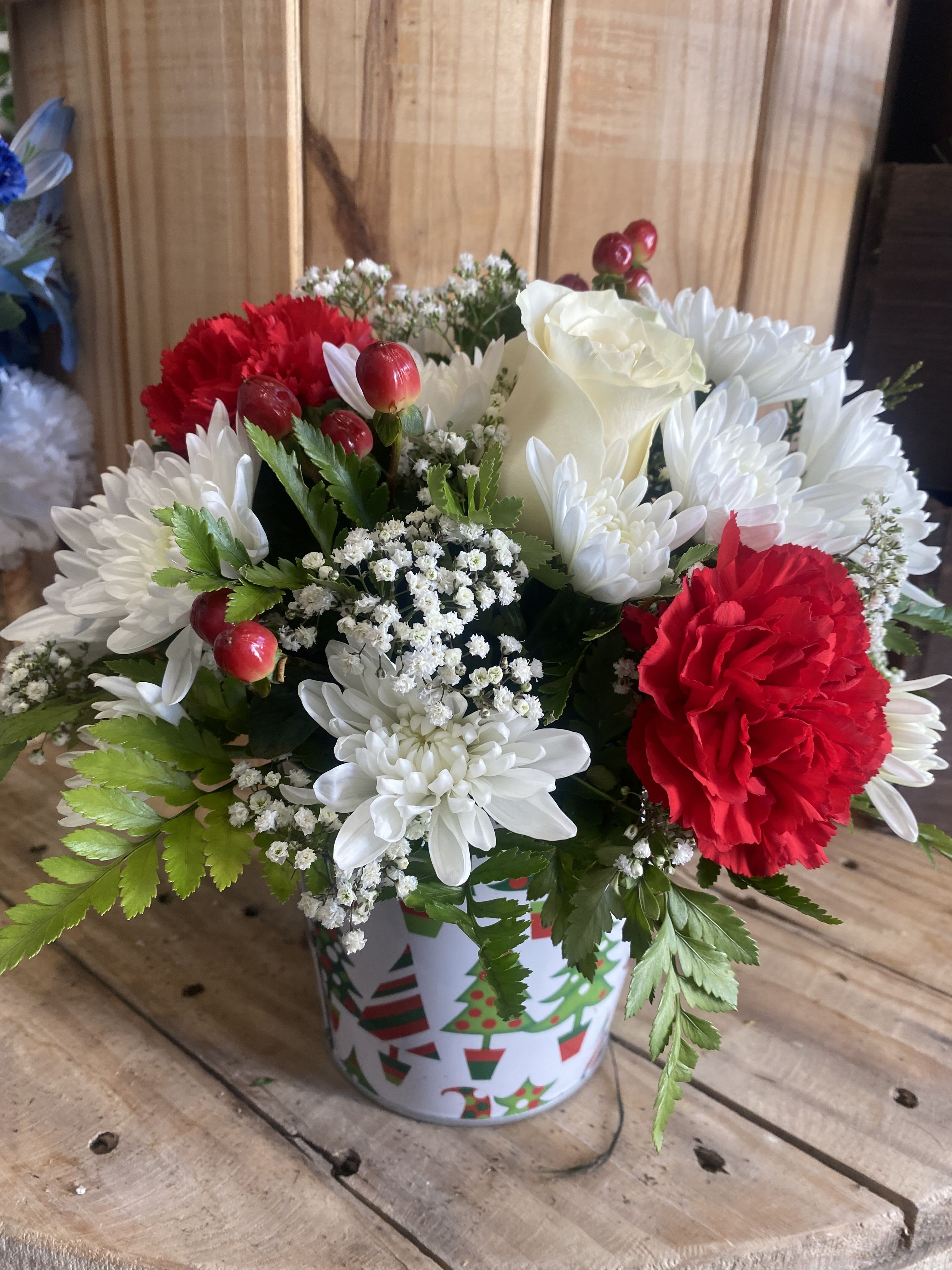 Holiday Arrangement  - Tis the Season! Arrangements will feature Roses, Carnations, Hypericum Berries and Holiday Greens! 