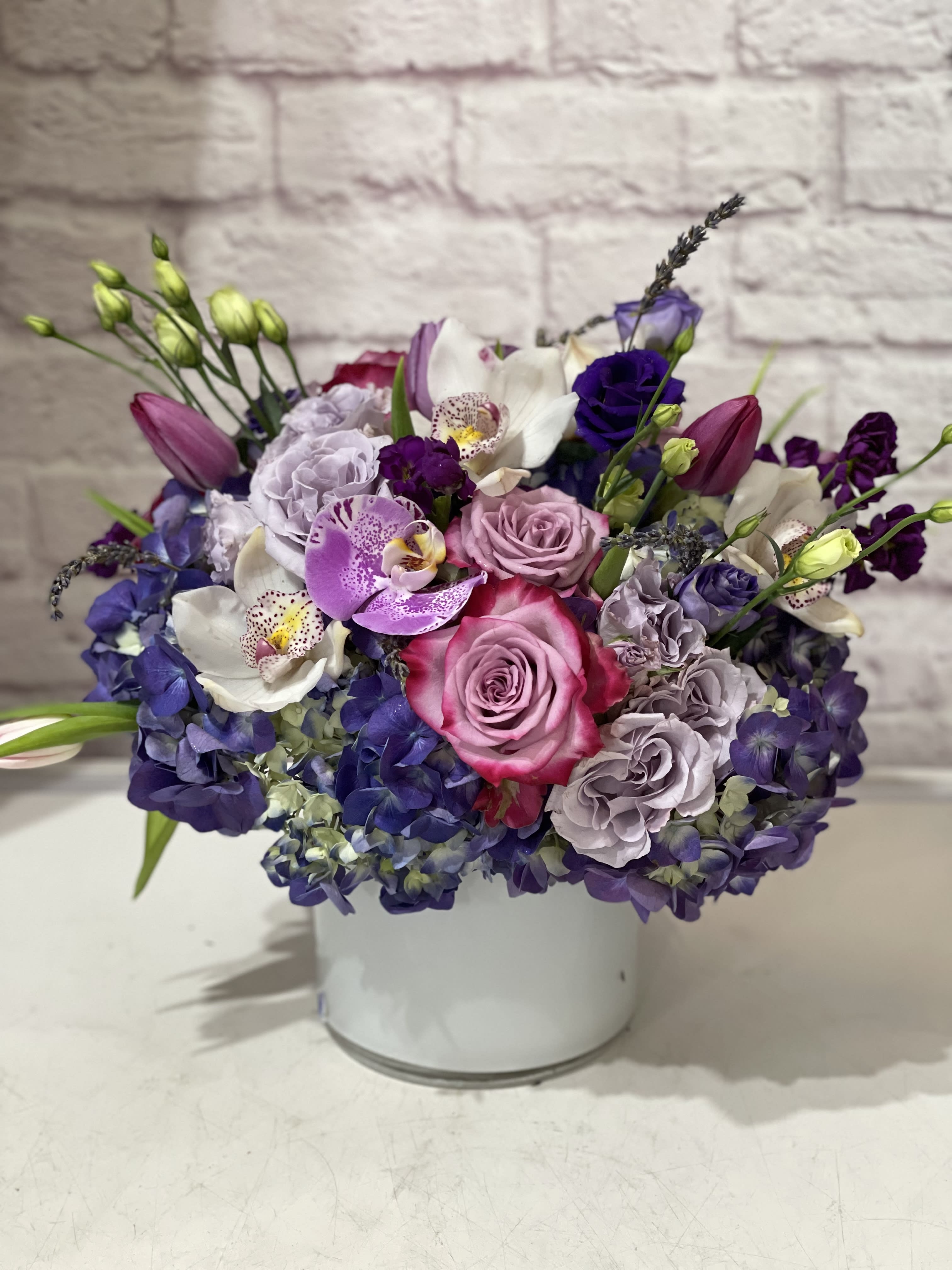 Royal Jewels  - An impressive flower bouquet arranged in a quality vase and filled to the rim! Made with a premium selection of seasonal blooms in regal jewel tones. Fit for a Queen and perfect for Mother’s Day!