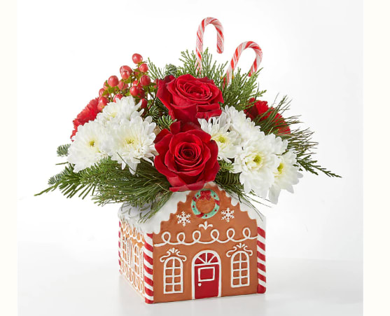 Gingerbread Bakery Bouquet - Share warmth and love with the Gingerbread Bakery Bouquet, a delectable blend of white and red stems, sure to have you dreaming of cinnamon, nutmeg and cloves. Details The Premium Bouquet is approximately 12&quot;H x 13&quot;W. Designed by florists, ready to display. For long–lasting blooms, replace the water daily. We suggest trimming the stems every couple days.   Bloom Details Carnation, Rose, Hypericum Berry, Christmas Greens
