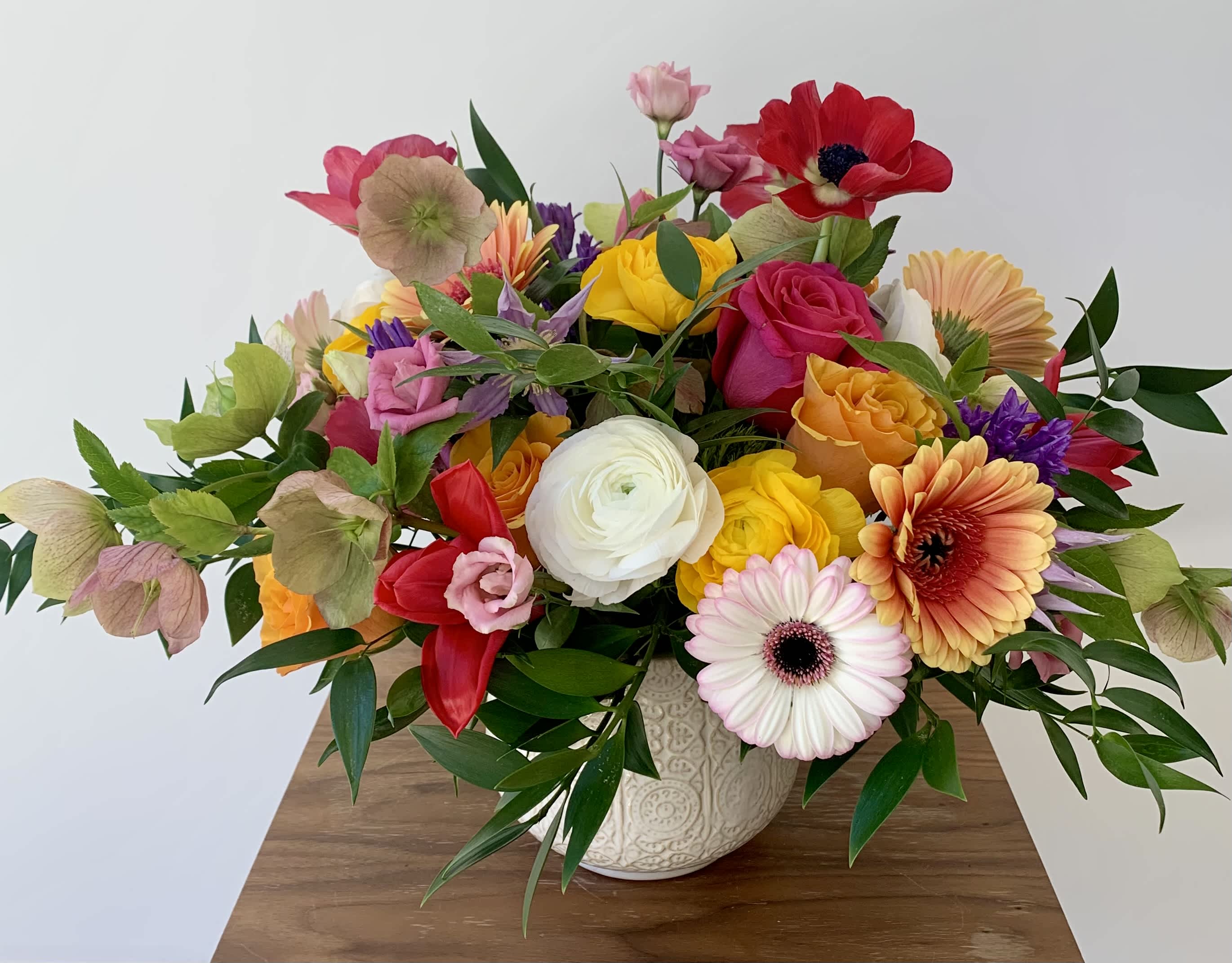 Flower Crush - A colorful fresh flower centerpiece with a wide variety of premium flowers and greenery arranged in a ceramic vase. The flower mix may vary but I always create a unique fun lush flower arrangement using high quality of flowers.