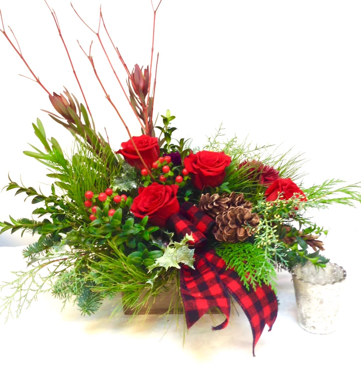 CELEBRATE THE SEASON  - BEAUTIFUL SEASONAL ARRANGEMENT WITH A  VARIETY OF CHRISTMAS GREENS,  RED DOG WOOD, RED BERRIES AND RED ROSES. APPROX. DIMENSION 24&quot; LONG x 16&quot; WIDE x 21&quot; HIGH. HFS 201612-01